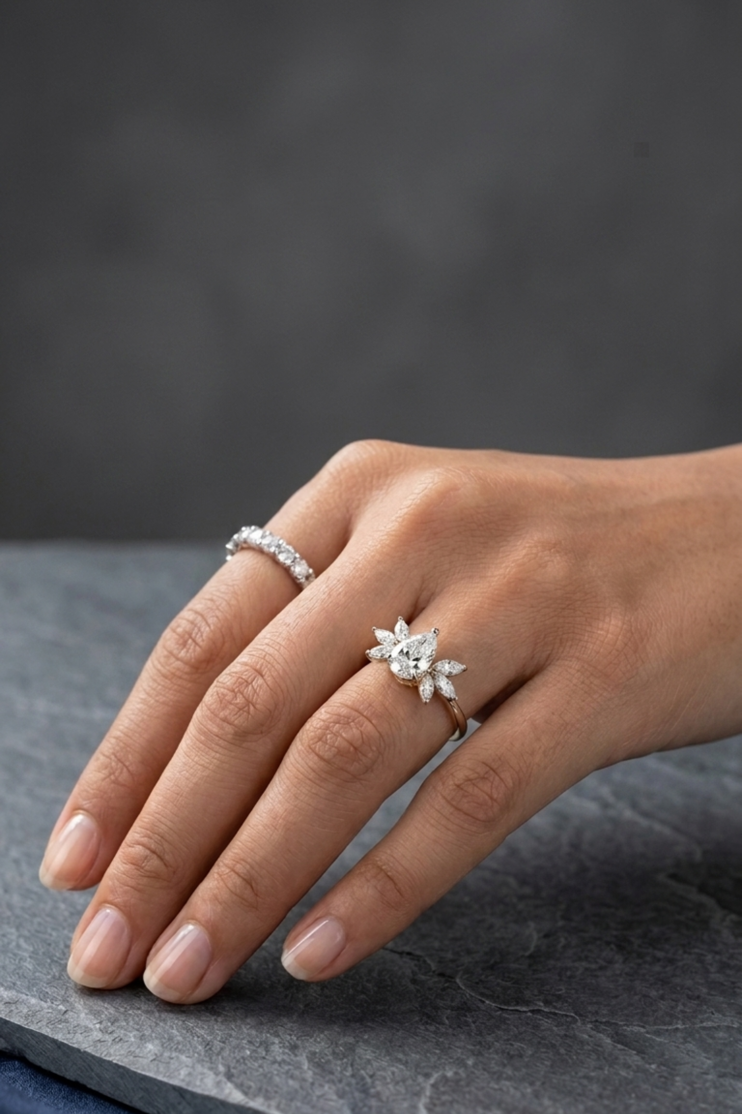 0.57Ct Mariposa Floral Pear Solitaire Ring in Ring Size 8