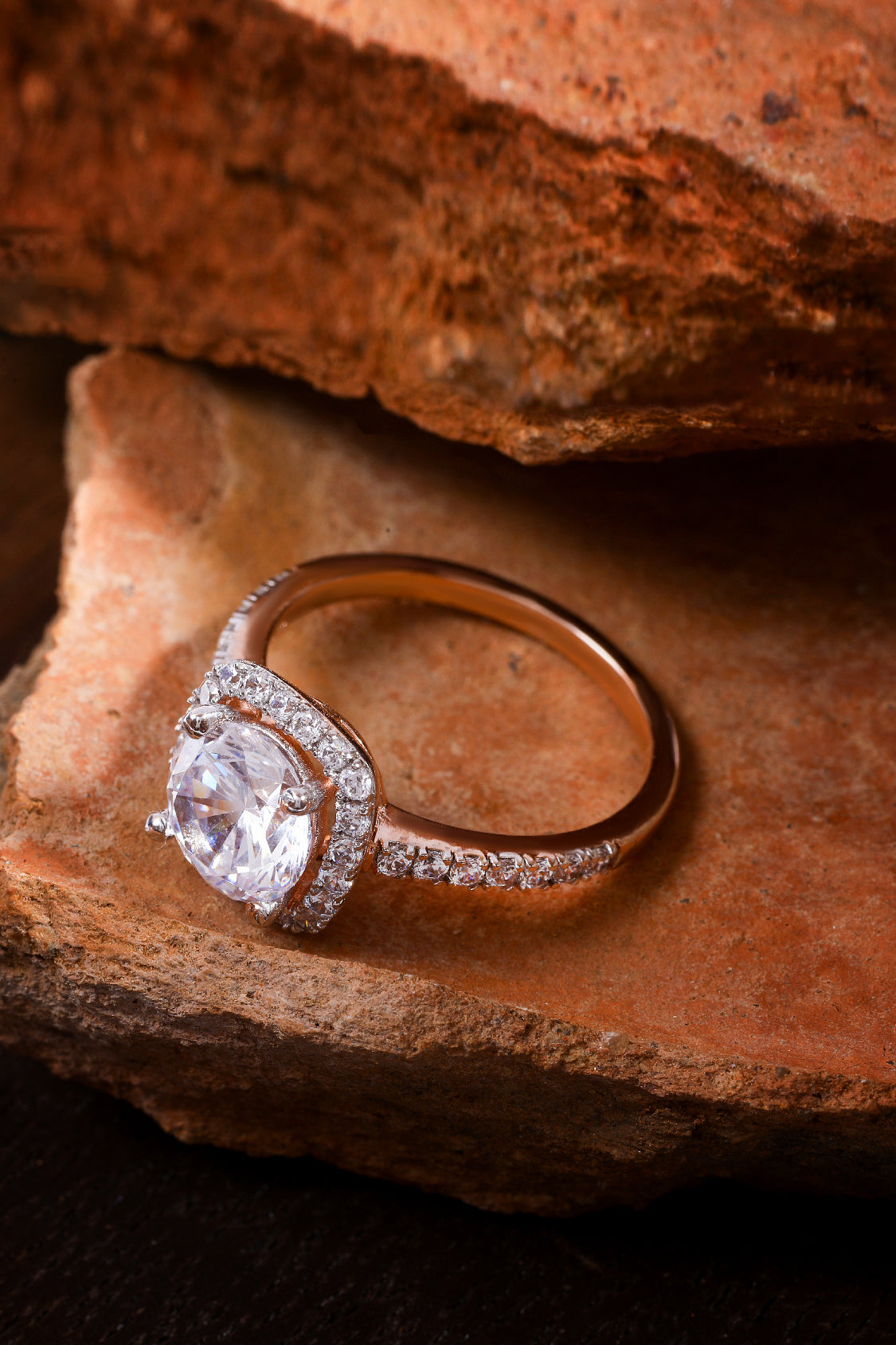 Rosalinda with Round Brilliant Solitaire and Halo on a Pave Ring