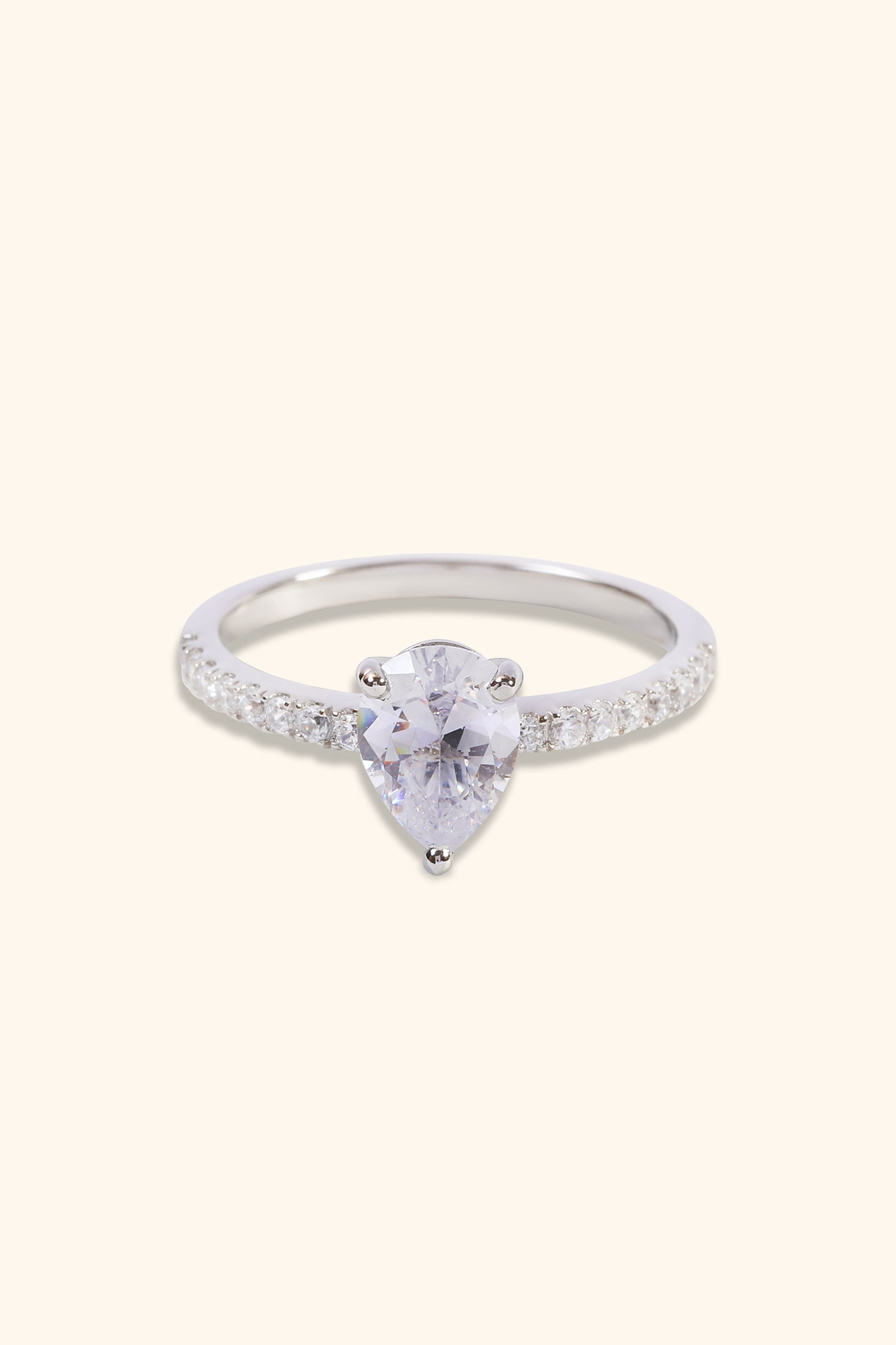 Dulce Pear Solitaire Ring on a Pavé Ring