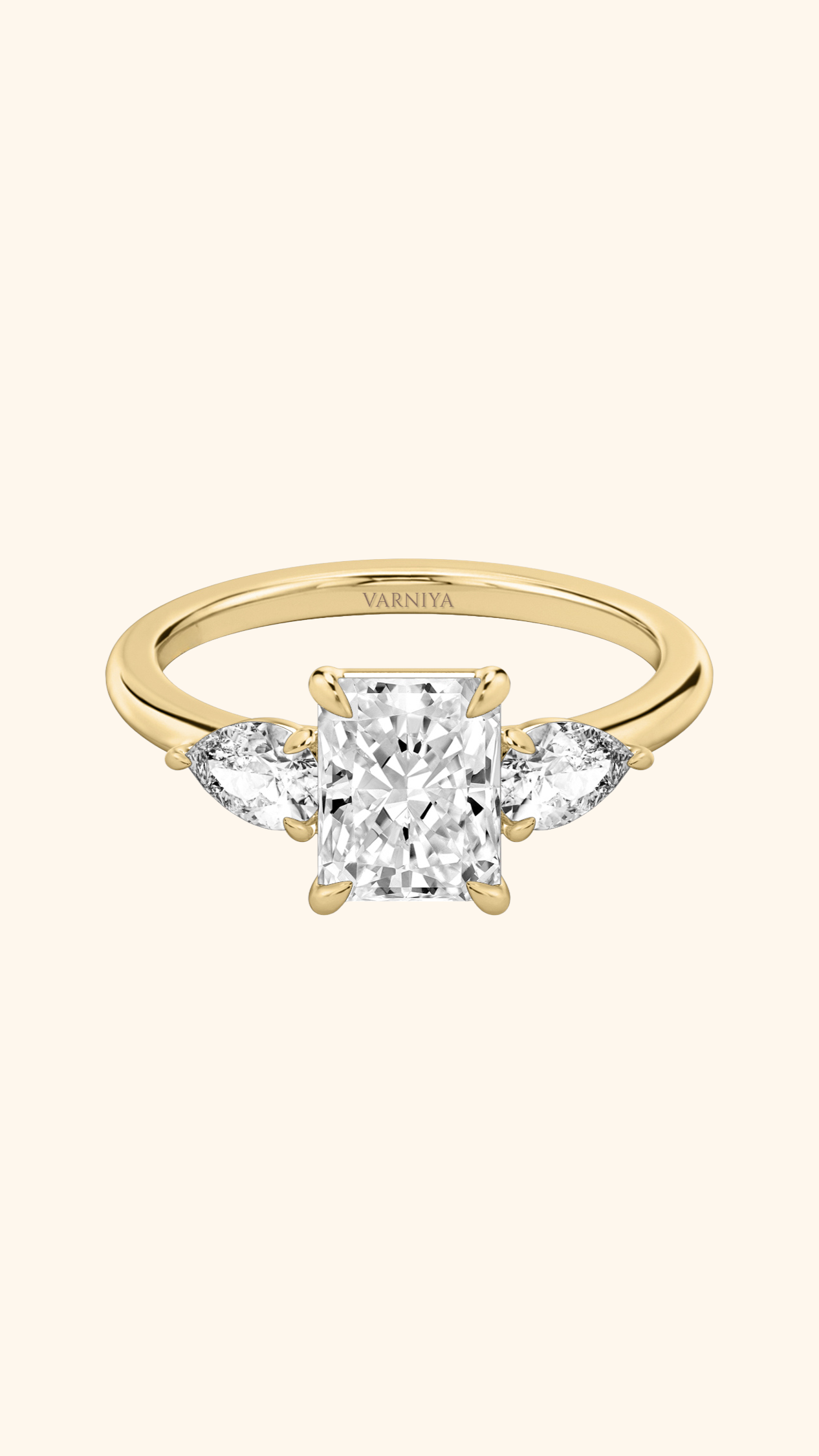 Trilogy Grace Radiant Solitaire Ring with Pear Side Stones