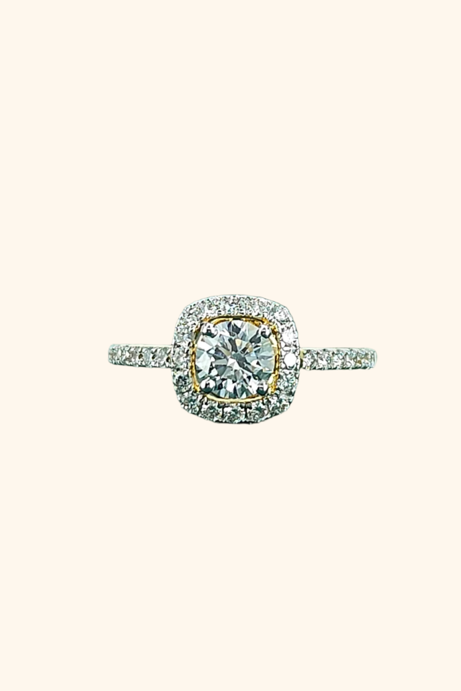 Rosalinda with Round Brilliant Solitaire and Halo on a Pave Ring