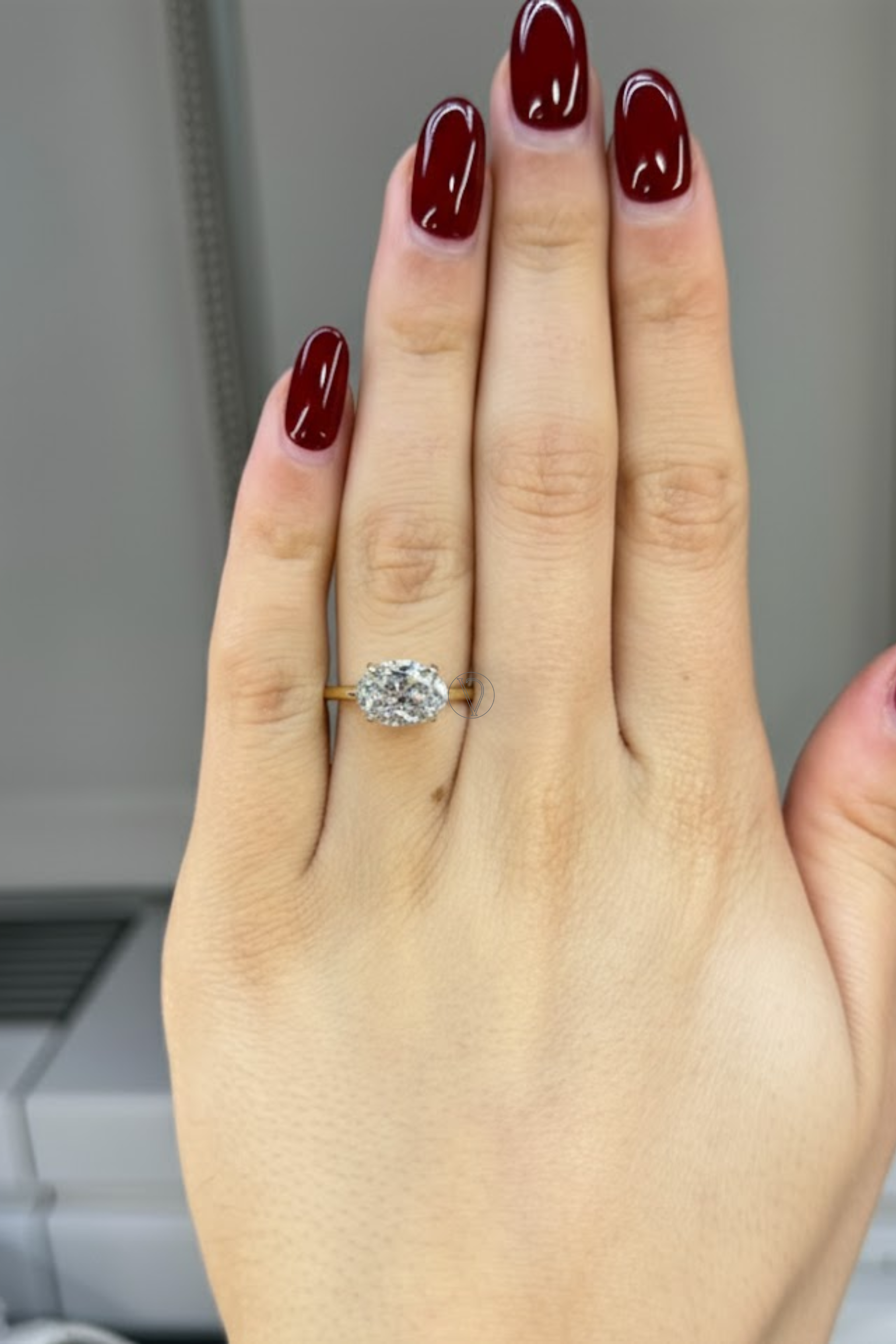 East West Oval Solitaire Ring
