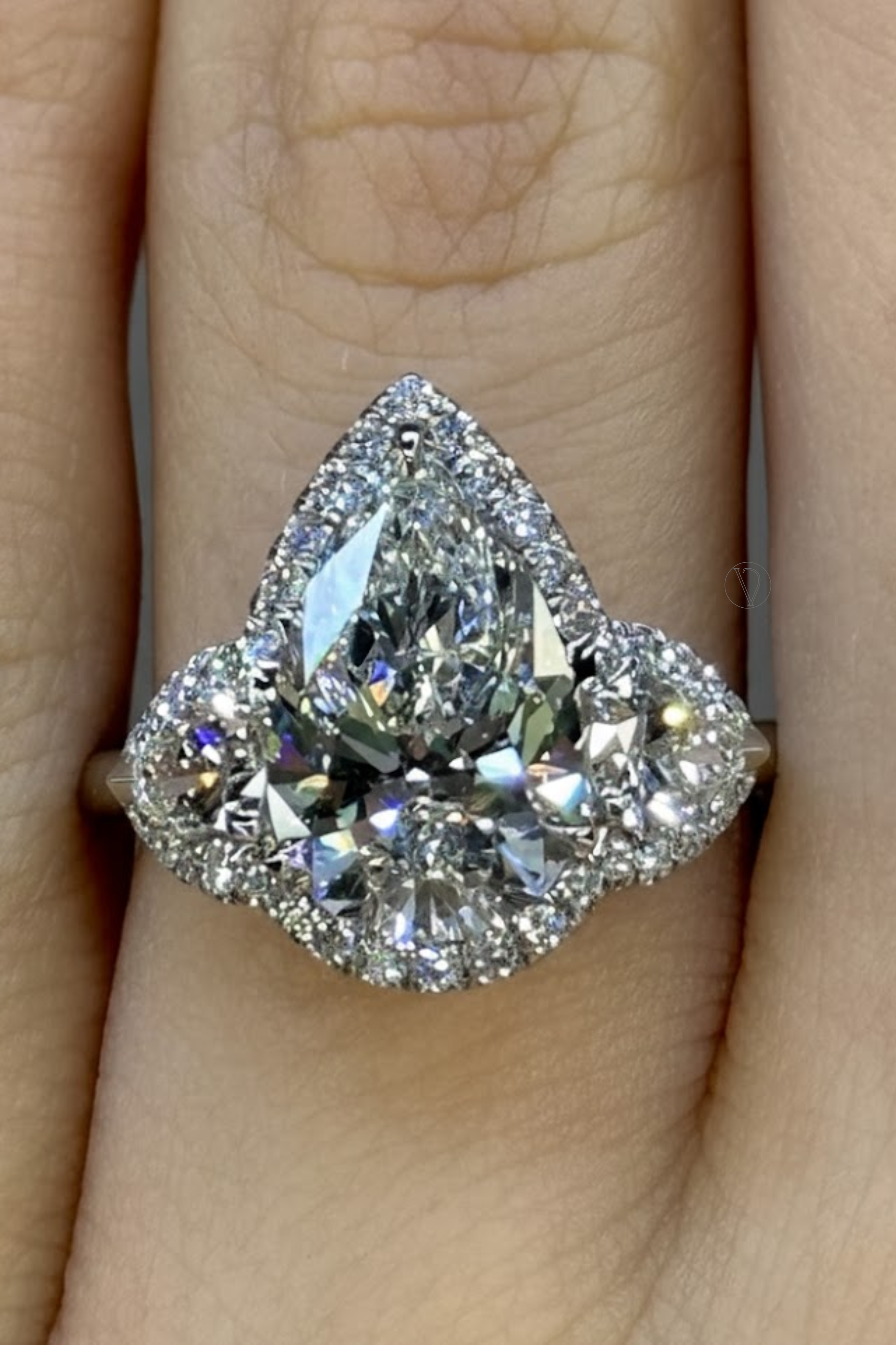 Pristara Three Stone Halo Ring