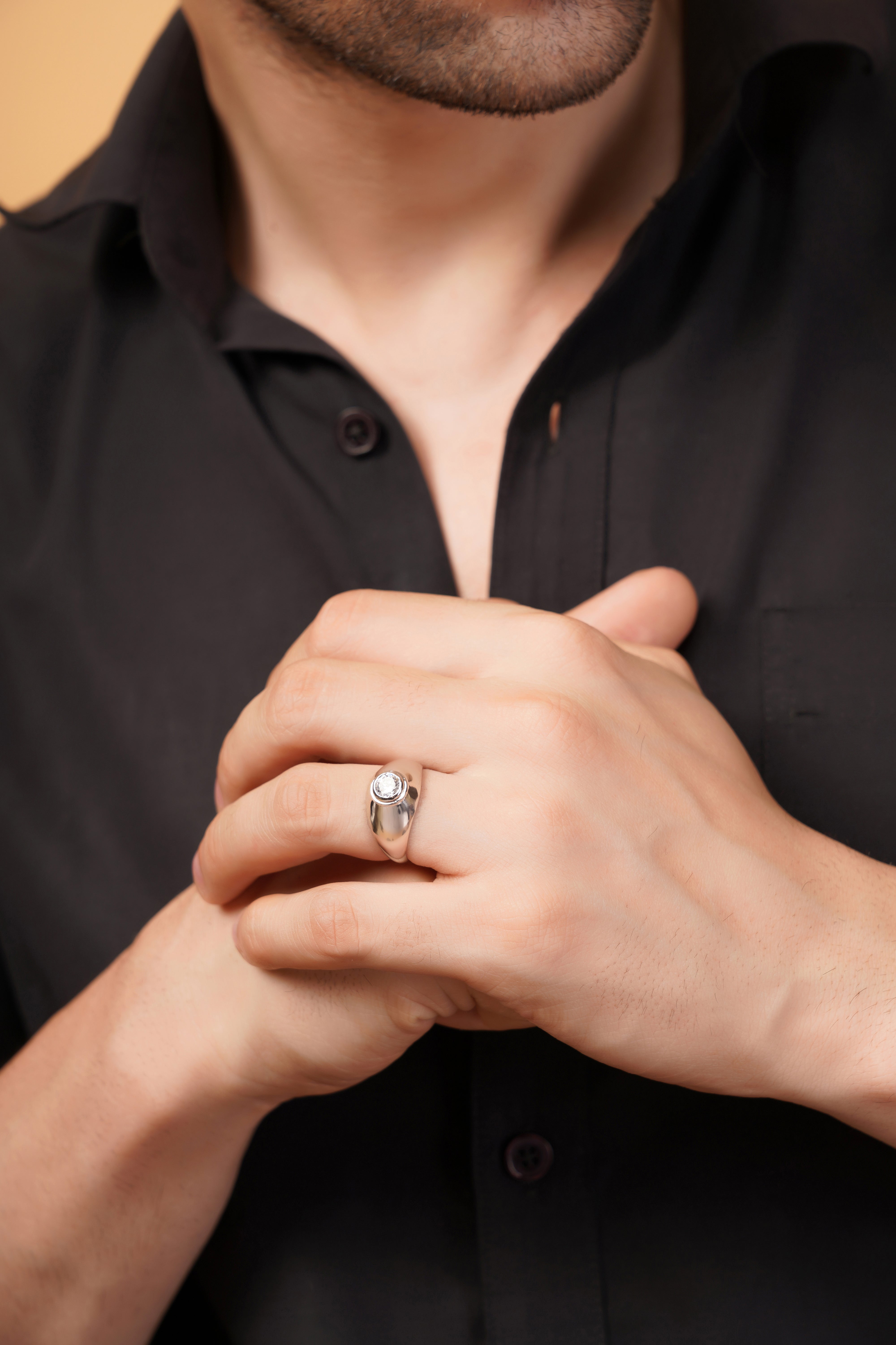 Regal Signet Ring with a Round Brilliant Solitaire