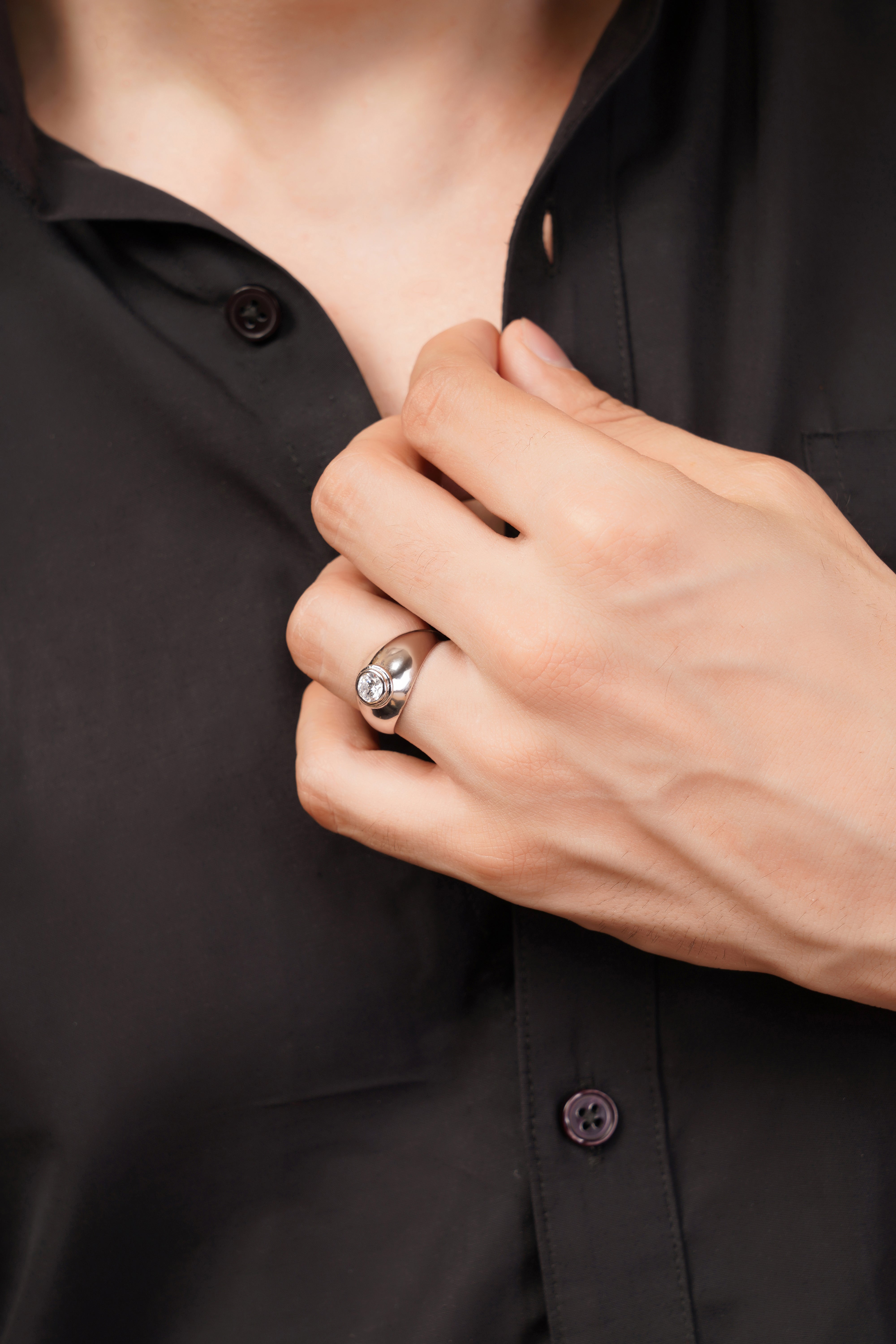 Regal Signet Ring with a Round Brilliant Solitaire