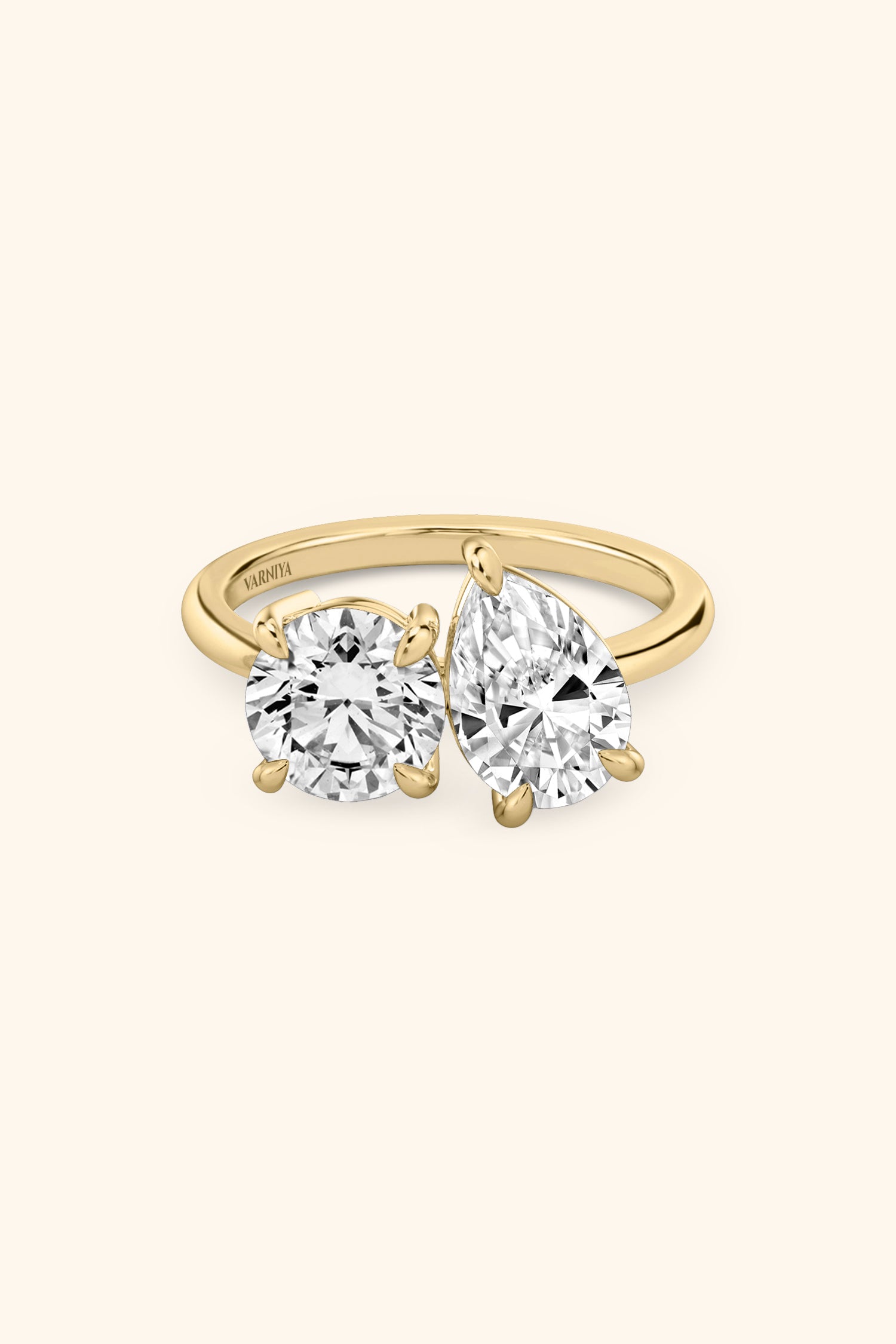 Luminosa Round and Pear Solitaire Ring