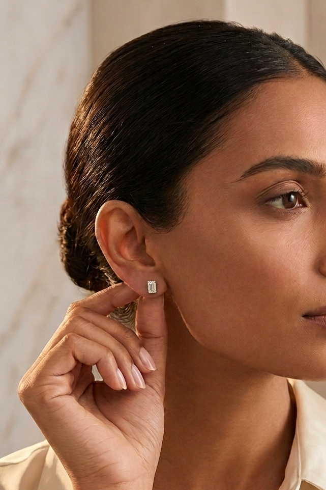Classic Diamond Studs set with an Emerald Solitaire