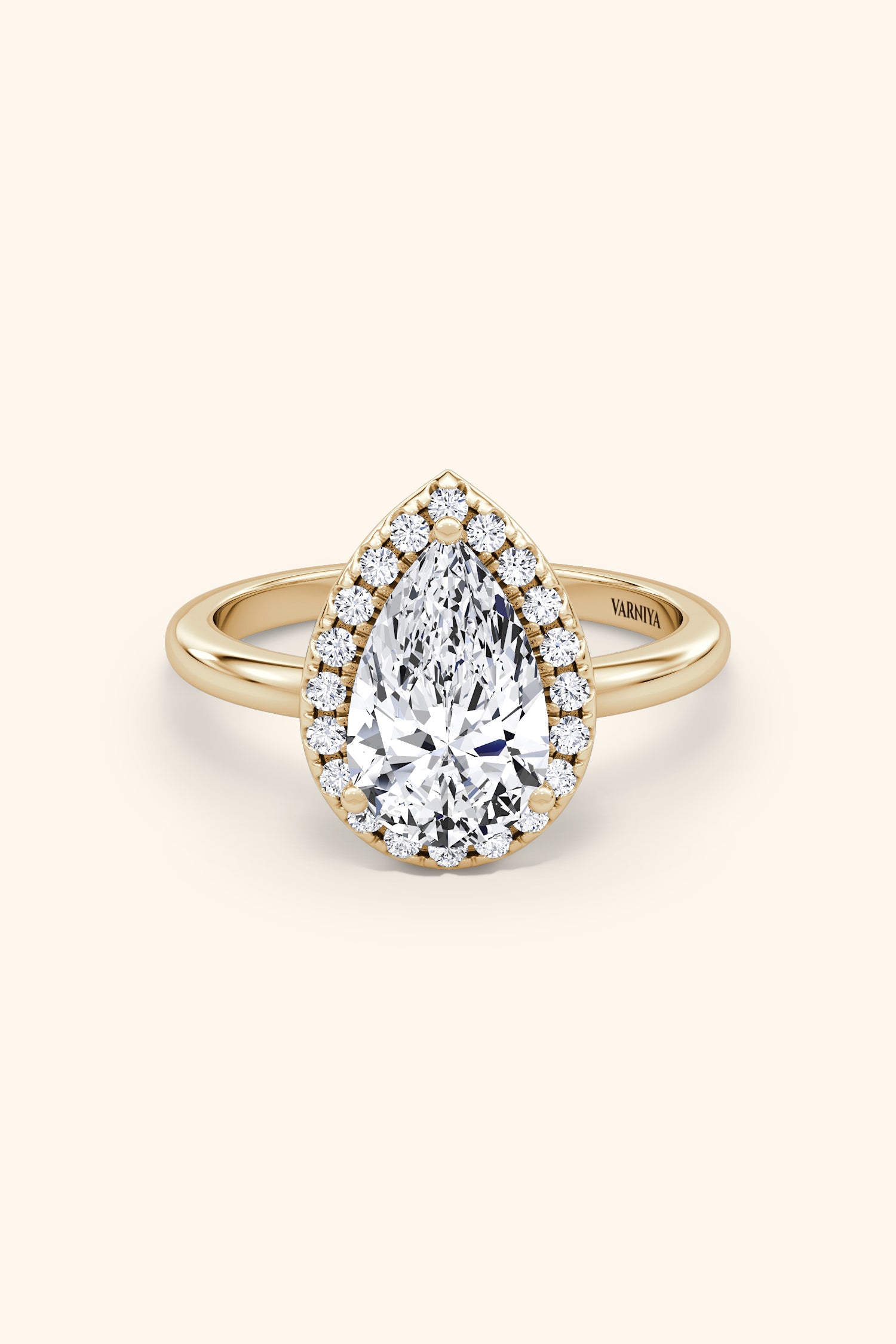 Angelica Pear Solitaire Ring with a Classic Halo