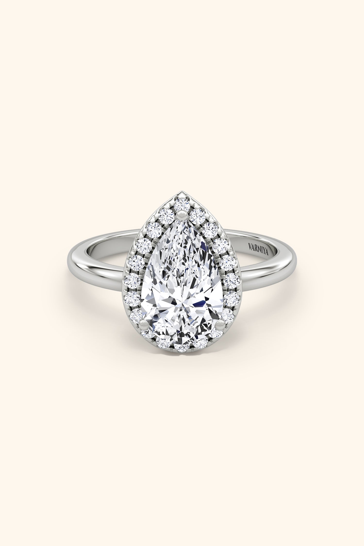 Angelica Pear Solitaire Ring with a Classic Halo
