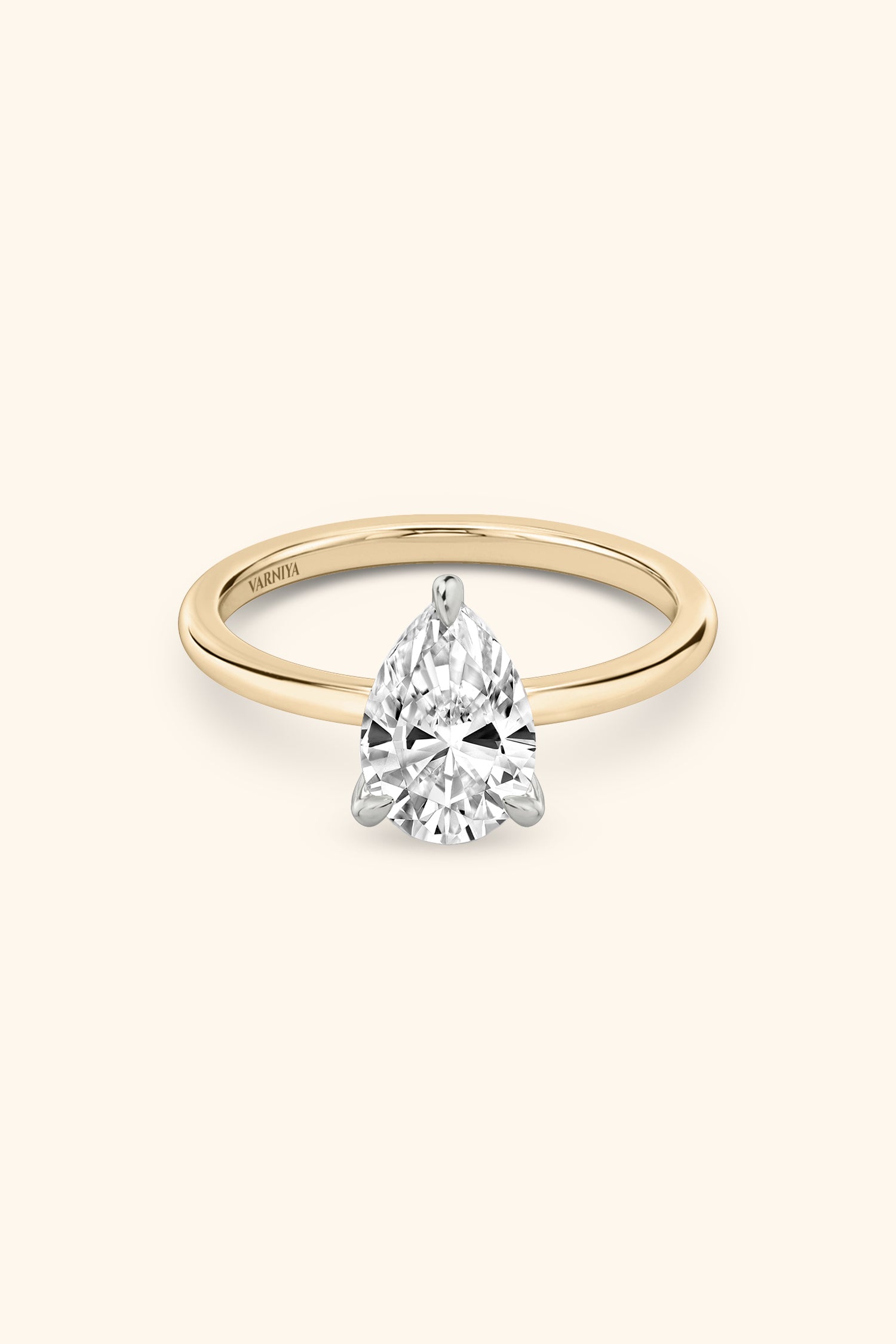 Dual Tone Glance Ring with Pear Solitaire.