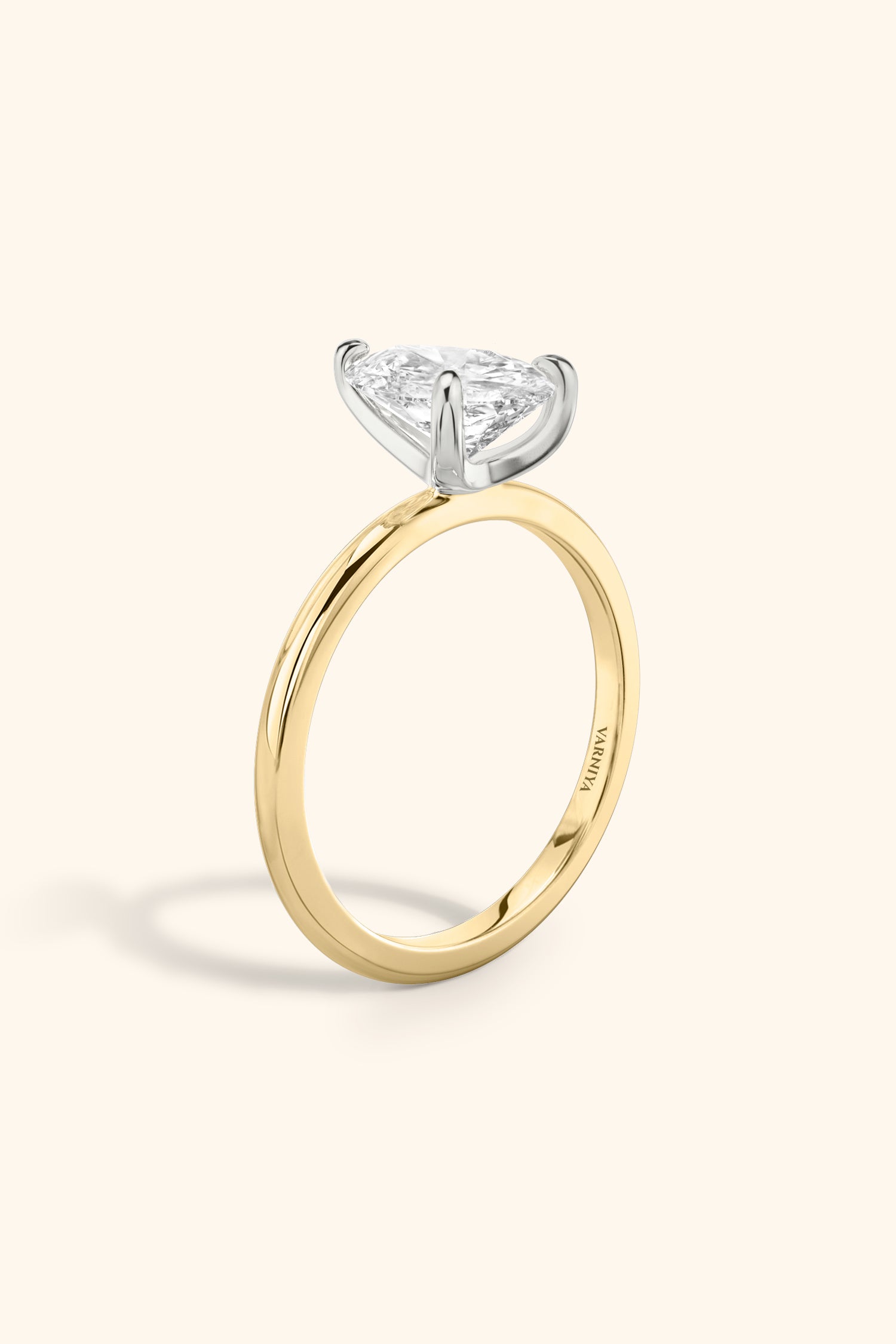 Dual Tone Glance Ring with Pear Solitaire.