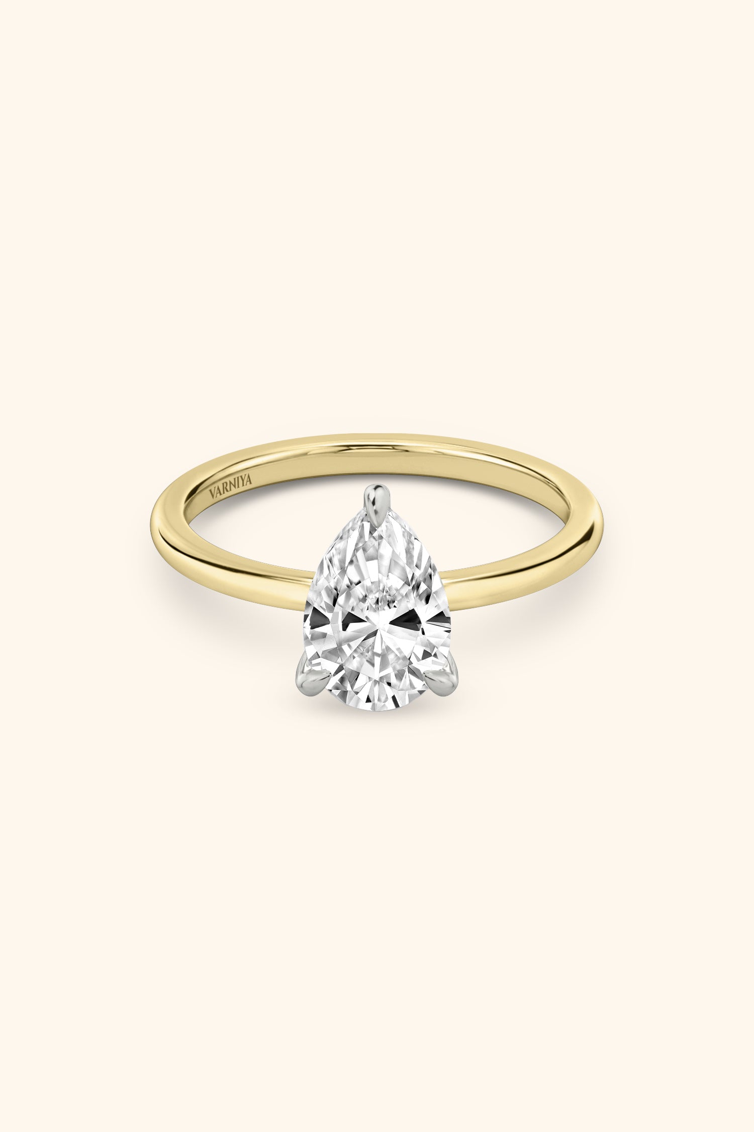 Dual Tone Glance Ring with Pear Solitaire.