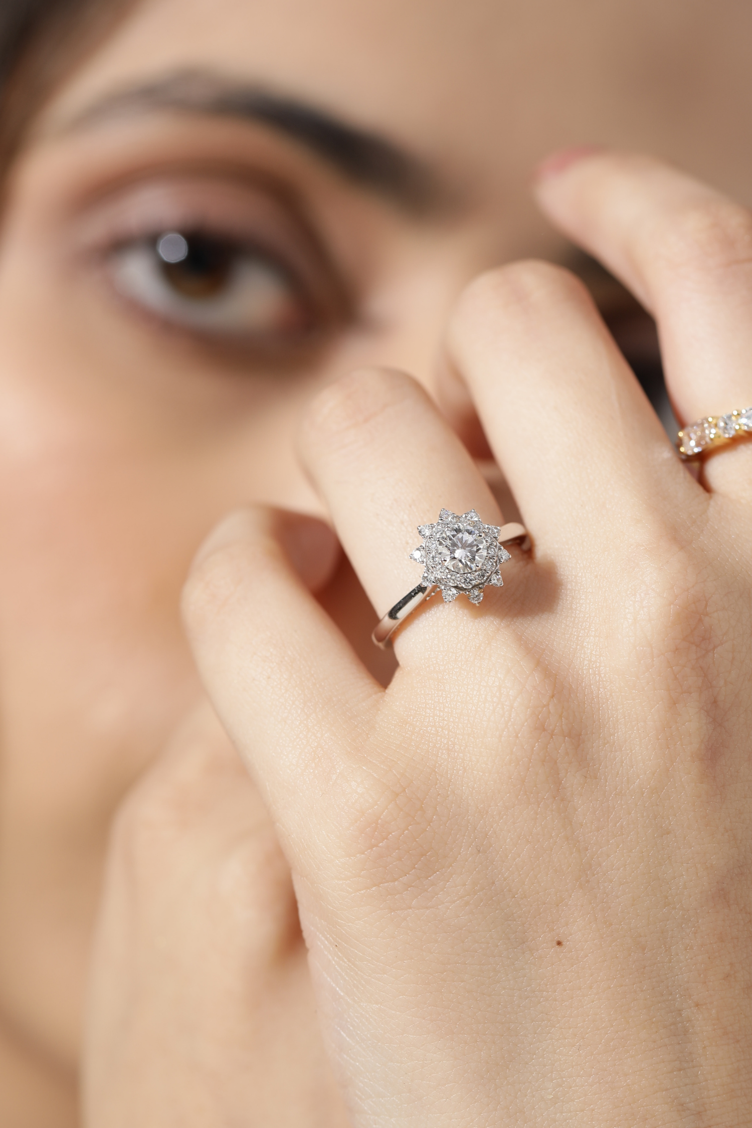 Roselyn Studded Halo Ring set with a Round Solitaire