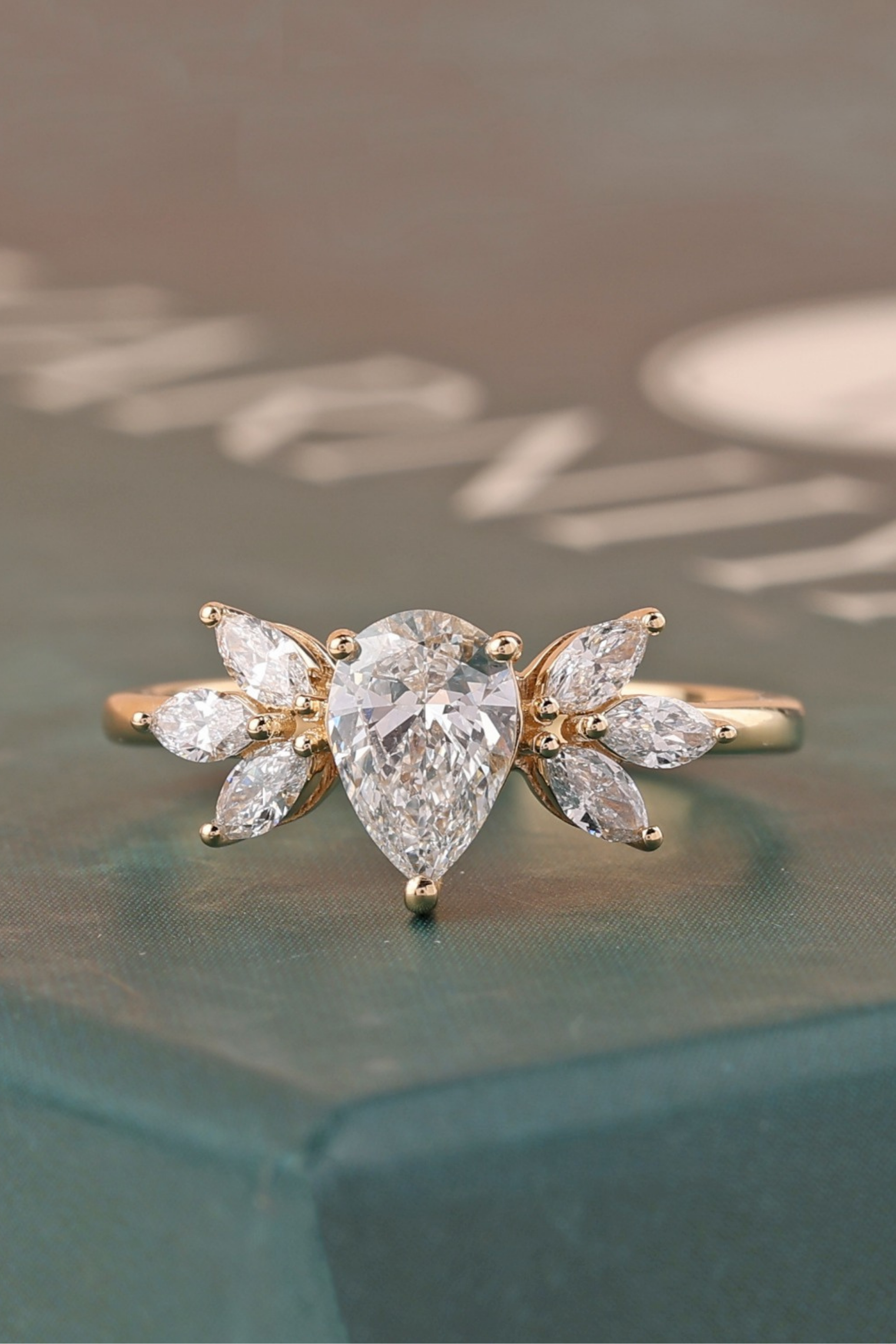 0.57Ct Mariposa Floral Pear Solitaire Ring in Ring Size 8