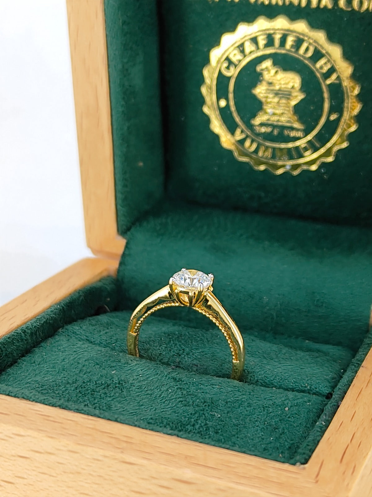 GABRIELA WITH A 0.90CT ROUND BRILLIANT SOLITAIRE RING