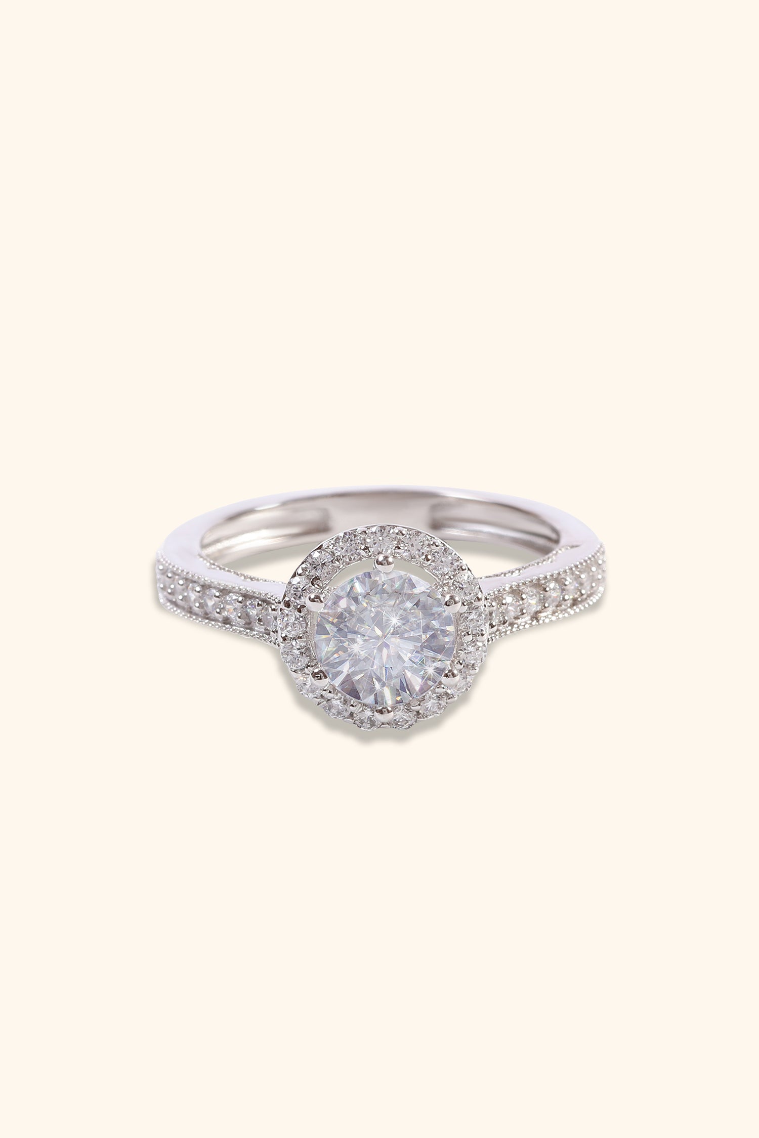 Gabriela with Round Brilliant Solitaire with Halo and Pavé Band