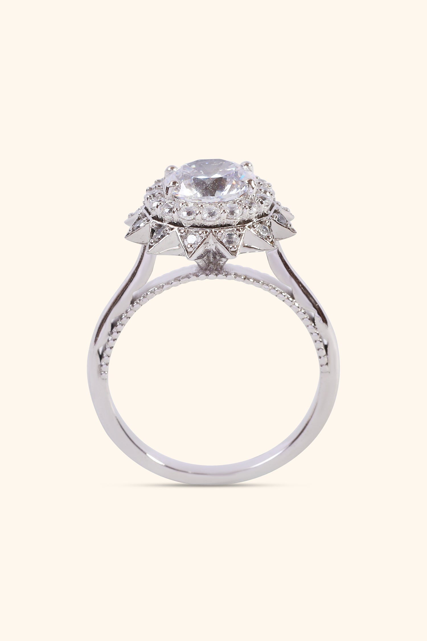 Roselyn Studded Halo Ring set with a Round Solitaire