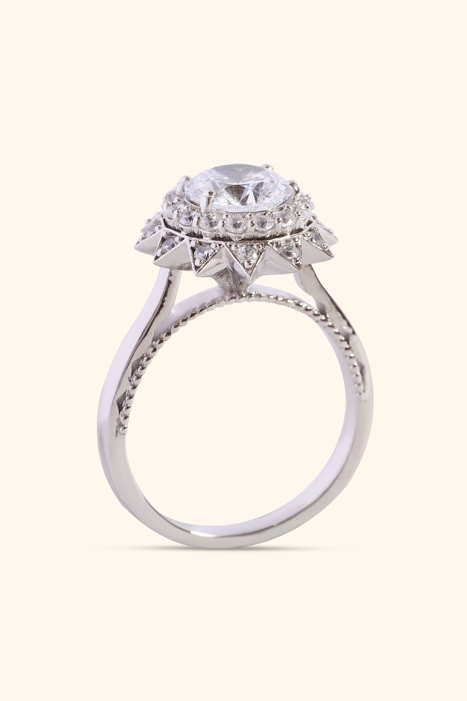 Roselyn Studded Halo Ring set with a Round Solitaire