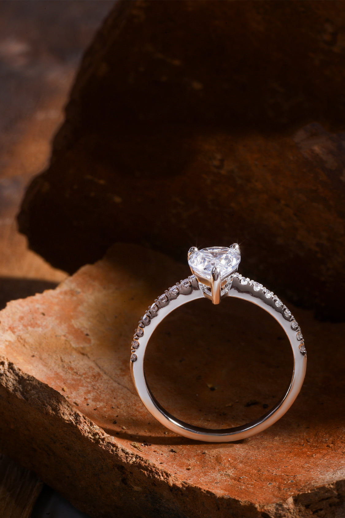 Dulce Pear Solitaire Ring on a Pavé Ring