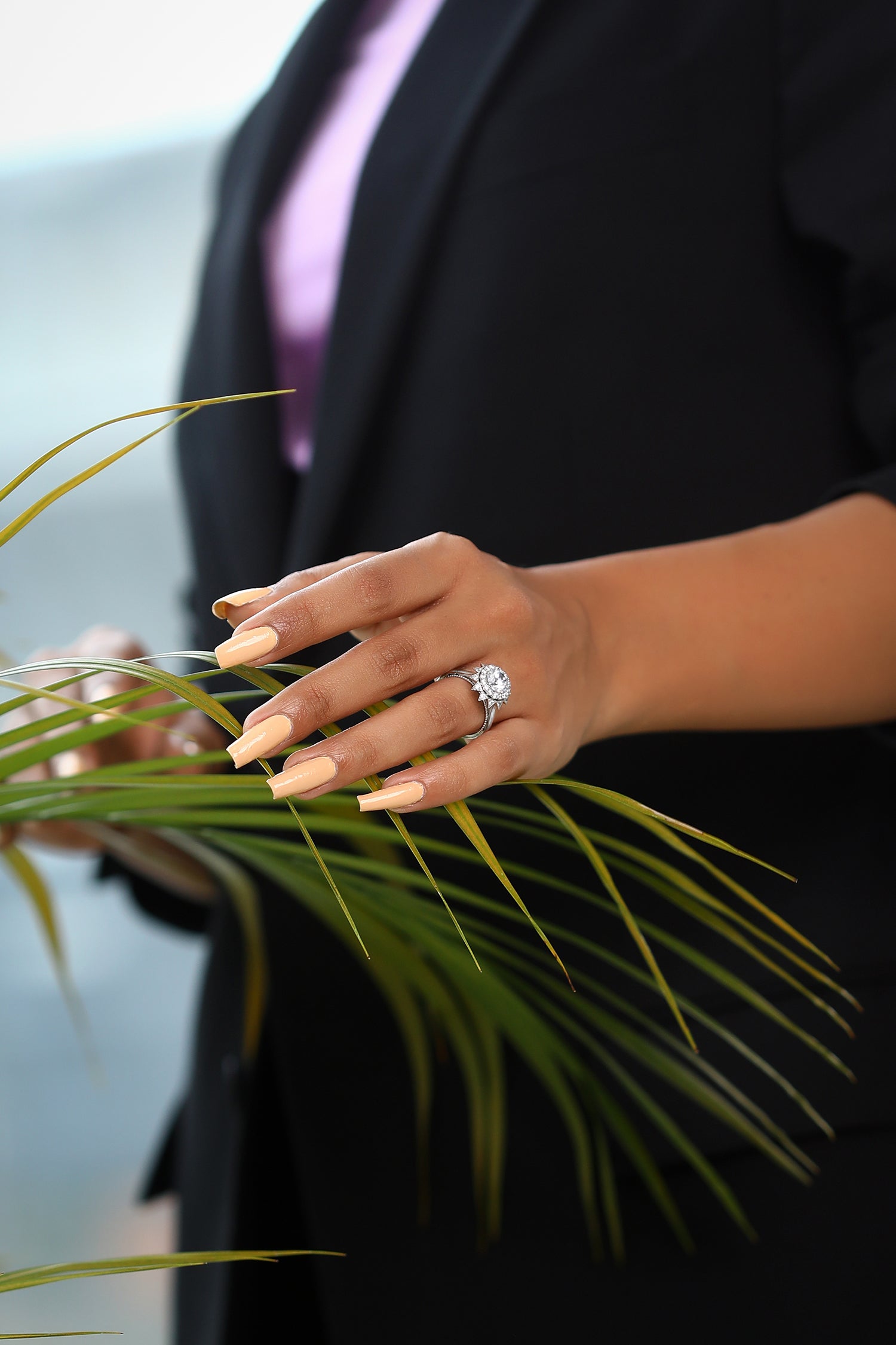 Roselyn Studded Halo Ring set with a Round Solitaire