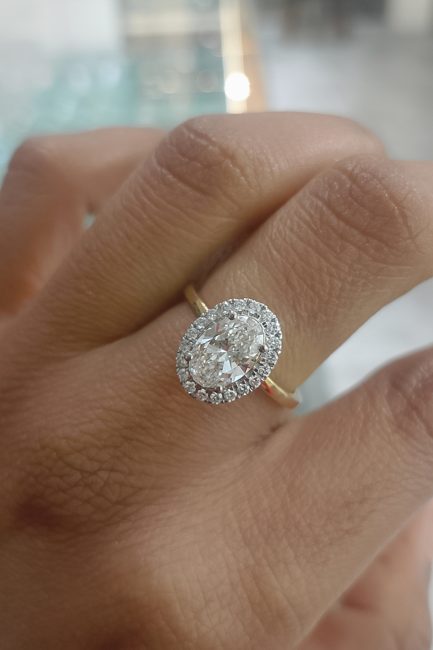 1.04Ct Angelica Halo with an Oval Solitaire in Ring Size 12
