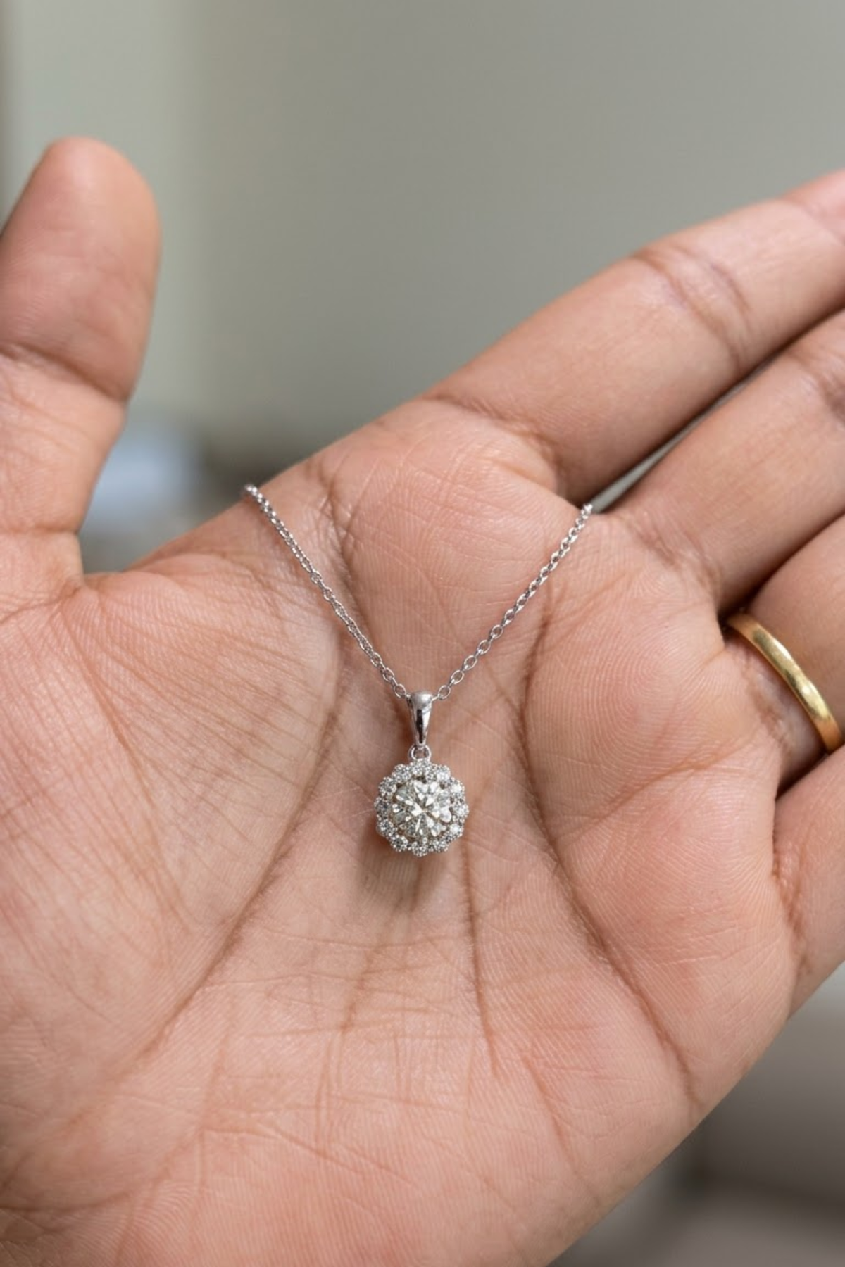 0.55Ct Snowflake Halo Round Brilliant Solitaire Pendant