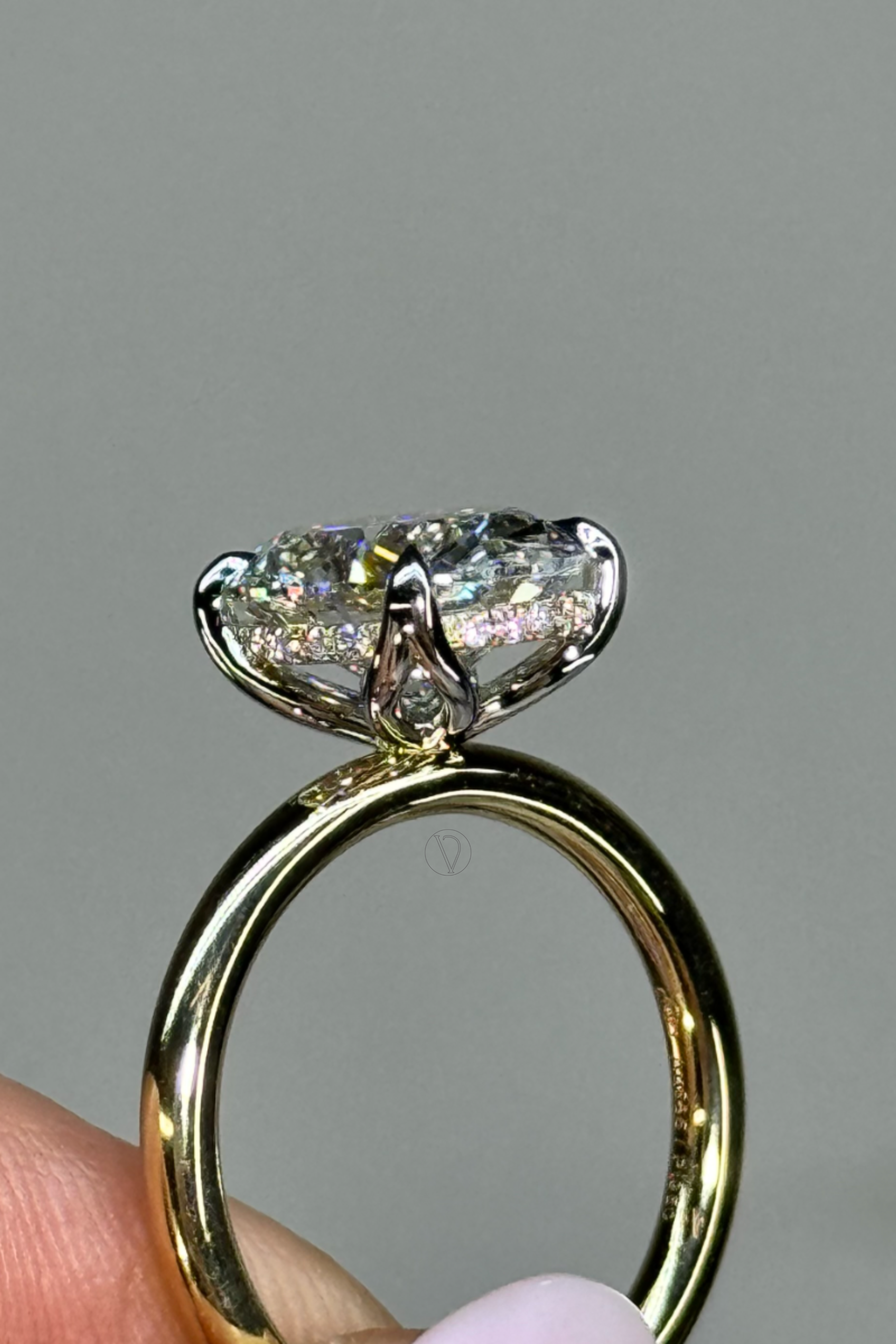 Lilian Oval Solitaire Halo Ring