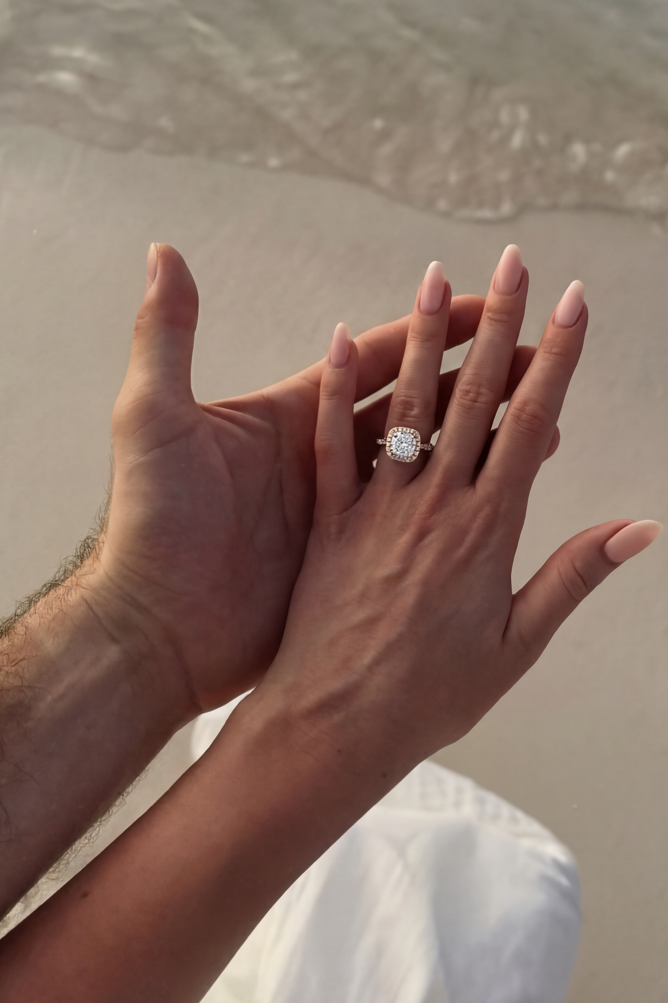 Rosalinda with Round Brilliant Solitaire and Halo on a Pave Ring