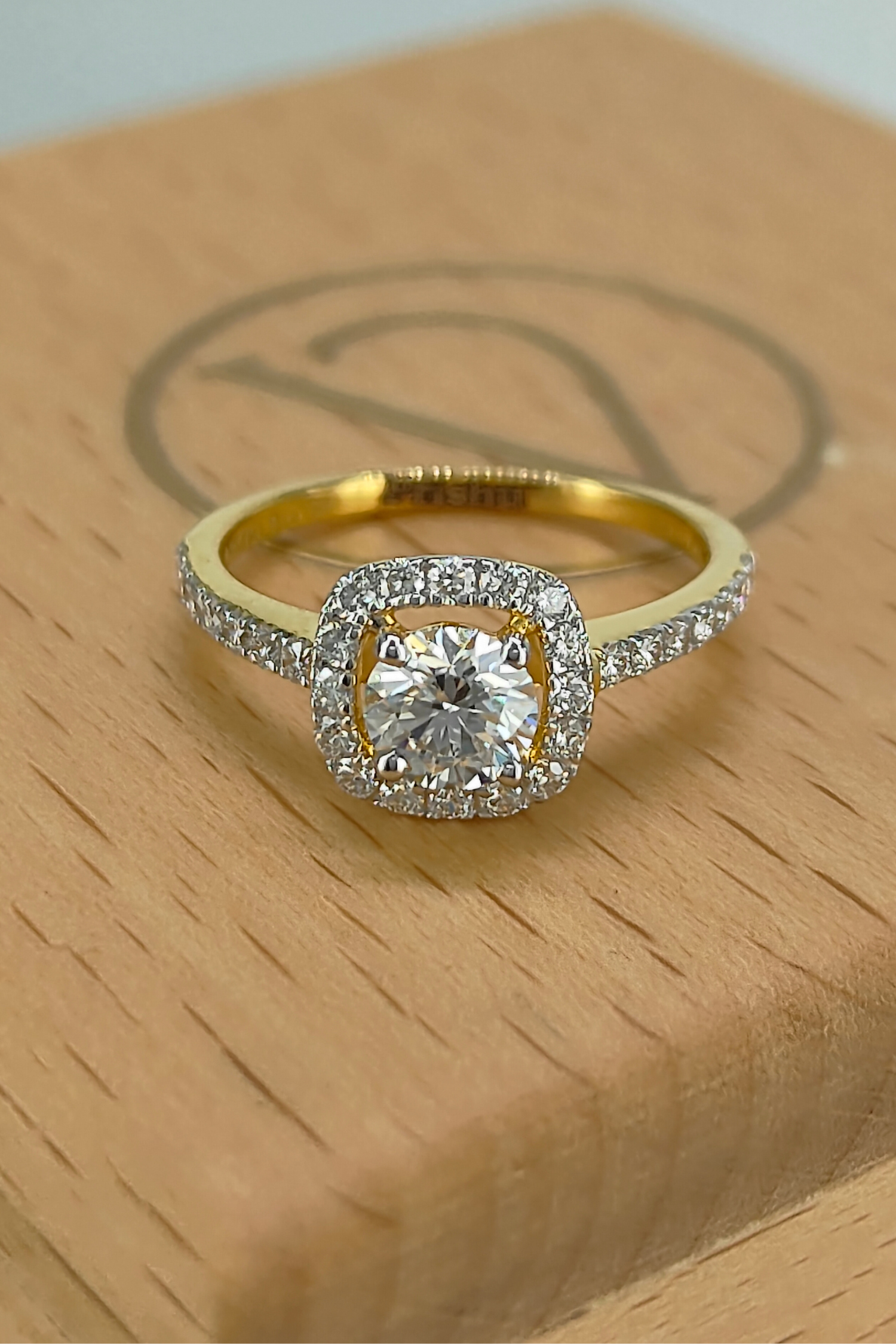 Rosalinda with Round Brilliant Solitaire and Halo on a Pave Ring