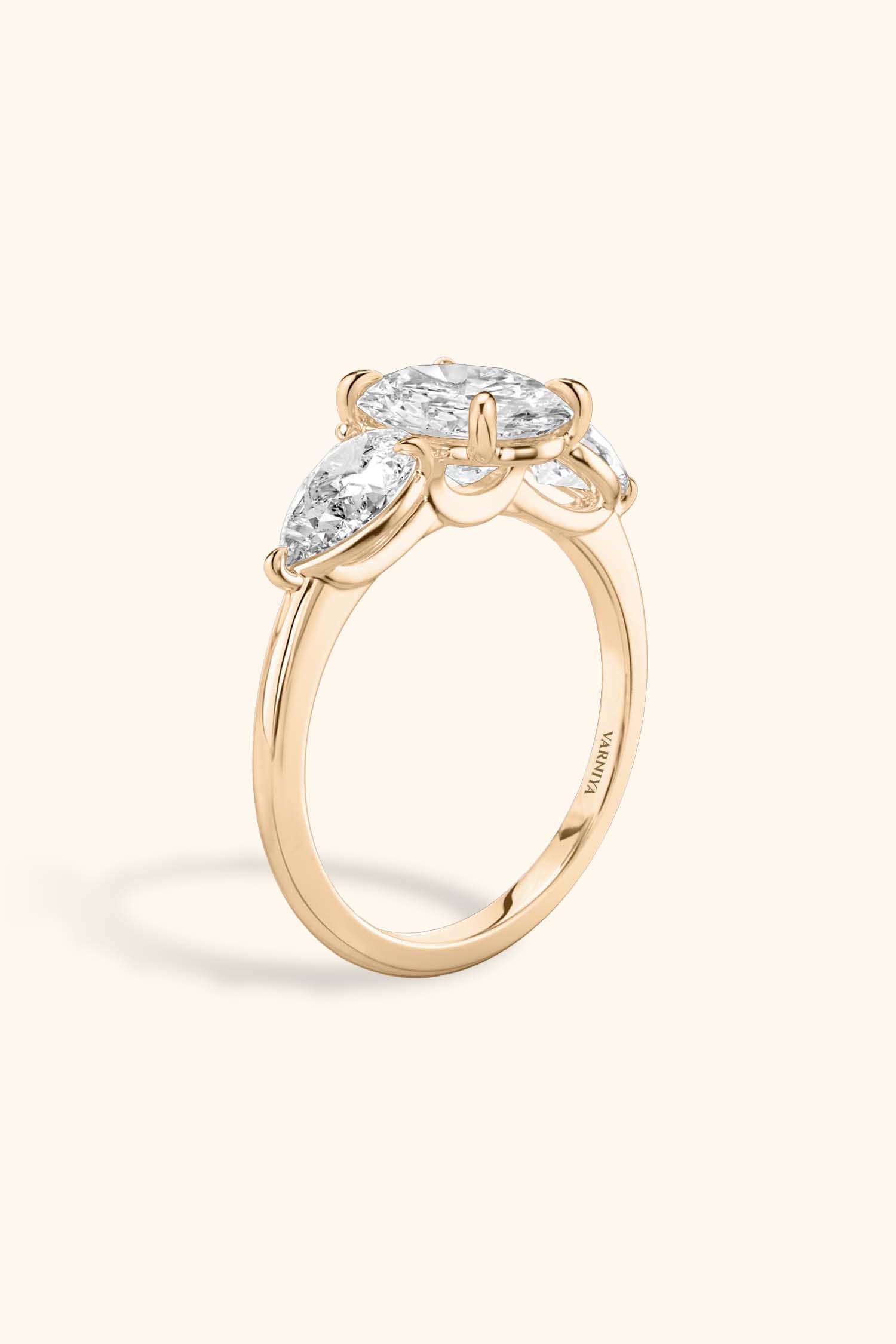 Trilogy Grace with Oval Solitaire Ring with 1/2 Carat Pear Side Stones