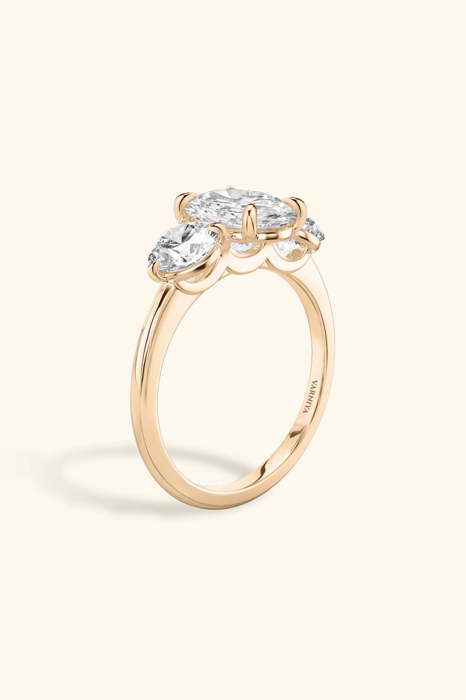 Trilogy Grace with Oval Solitaire Ring with 1/2 Carat Round Side Stones