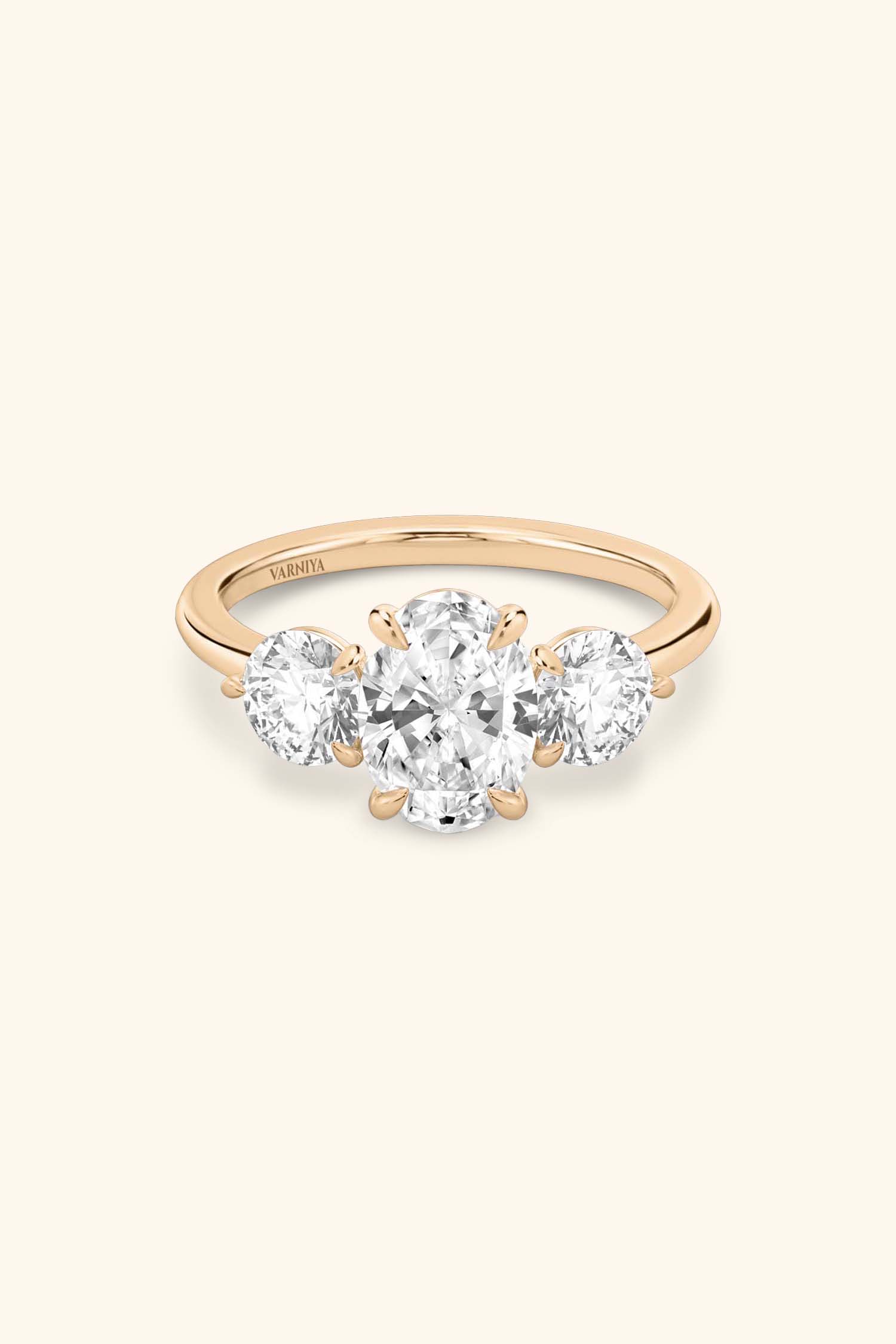 Trilogy Grace with Oval Solitaire Ring with 1/2 Carat Round Side Stones