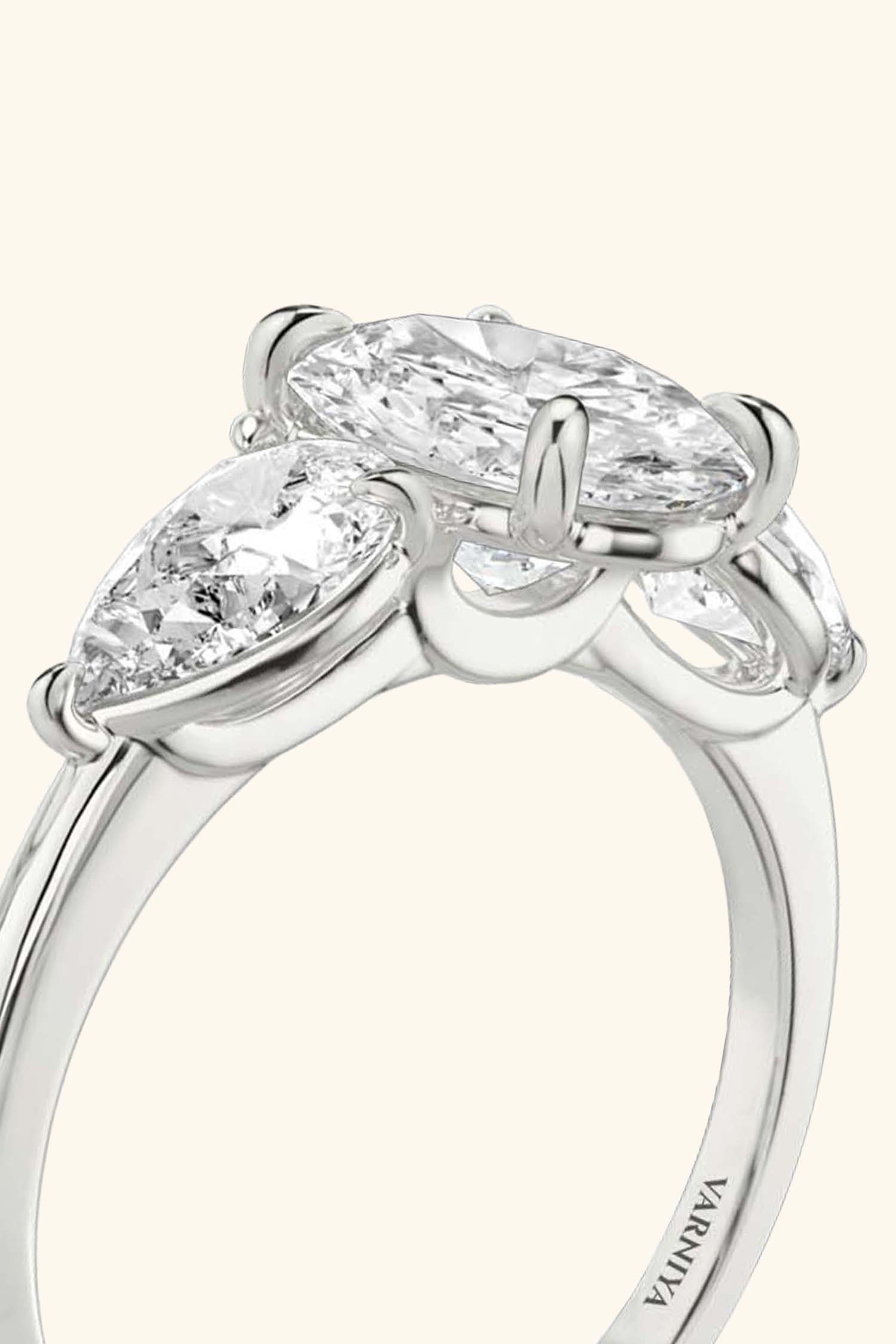 Trilogy Grace with Oval Solitaire Ring with 1/2 Carat Pear Side Stones