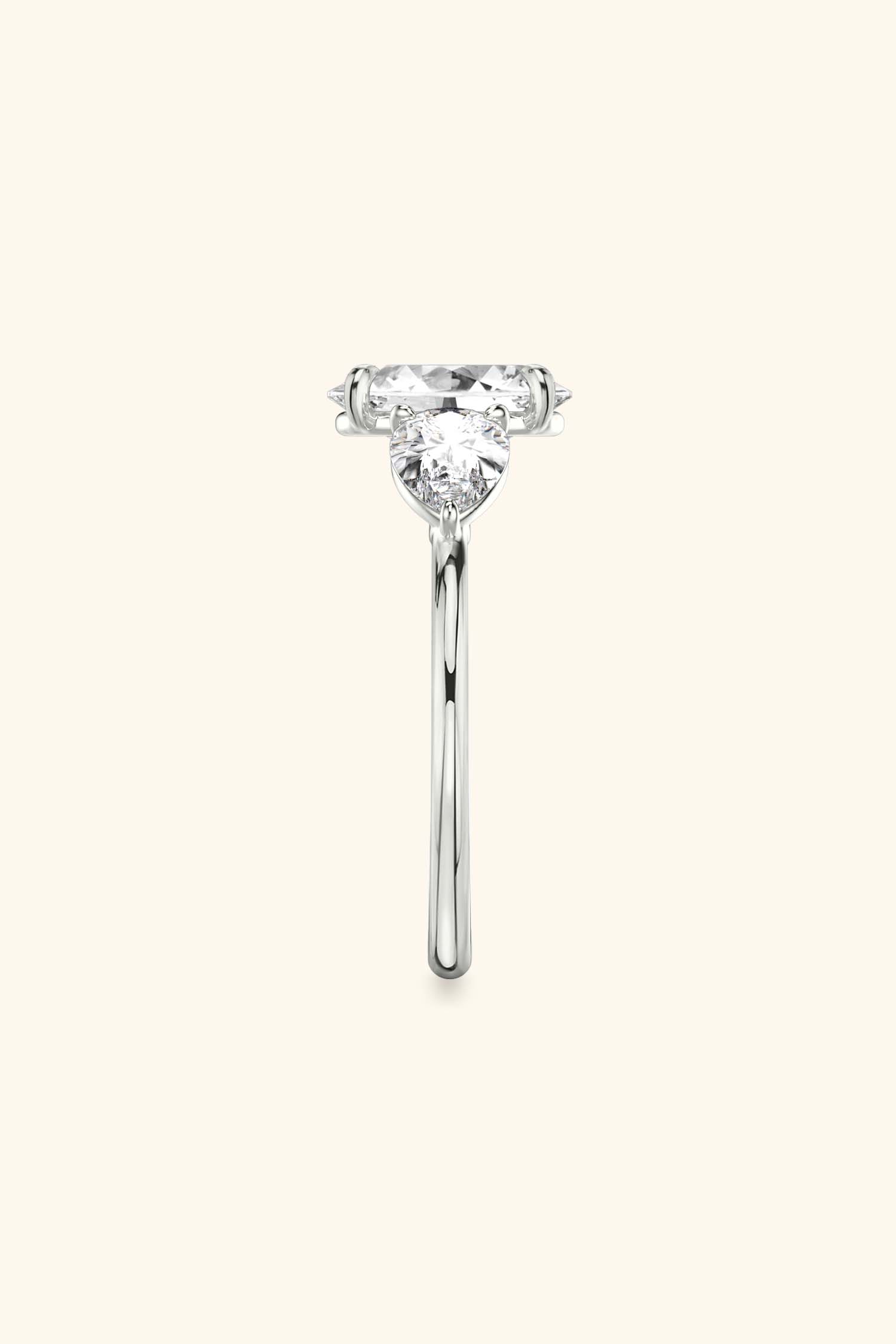 Trilogy Grace with Oval Solitaire Ring with 1/2 Carat Pear Side Stones