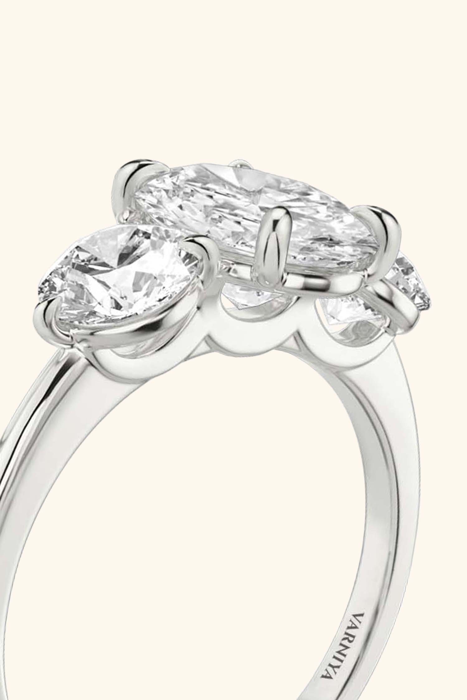 Trilogy Grace with Oval Solitaire Ring with 1/2 Carat Round Side Stones