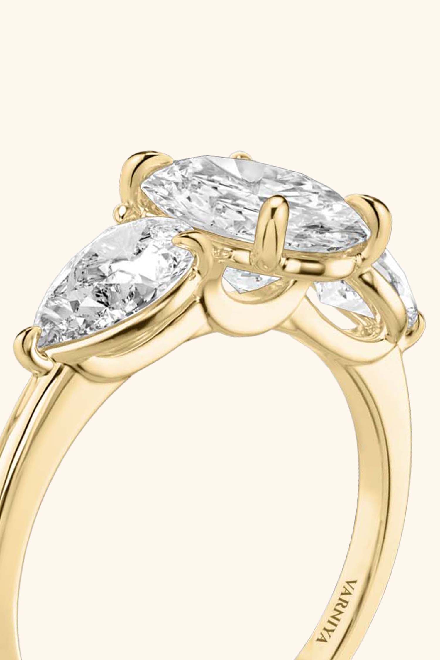 Trilogy Grace with Oval Solitaire Ring with 1/2 Carat Pear Side Stones