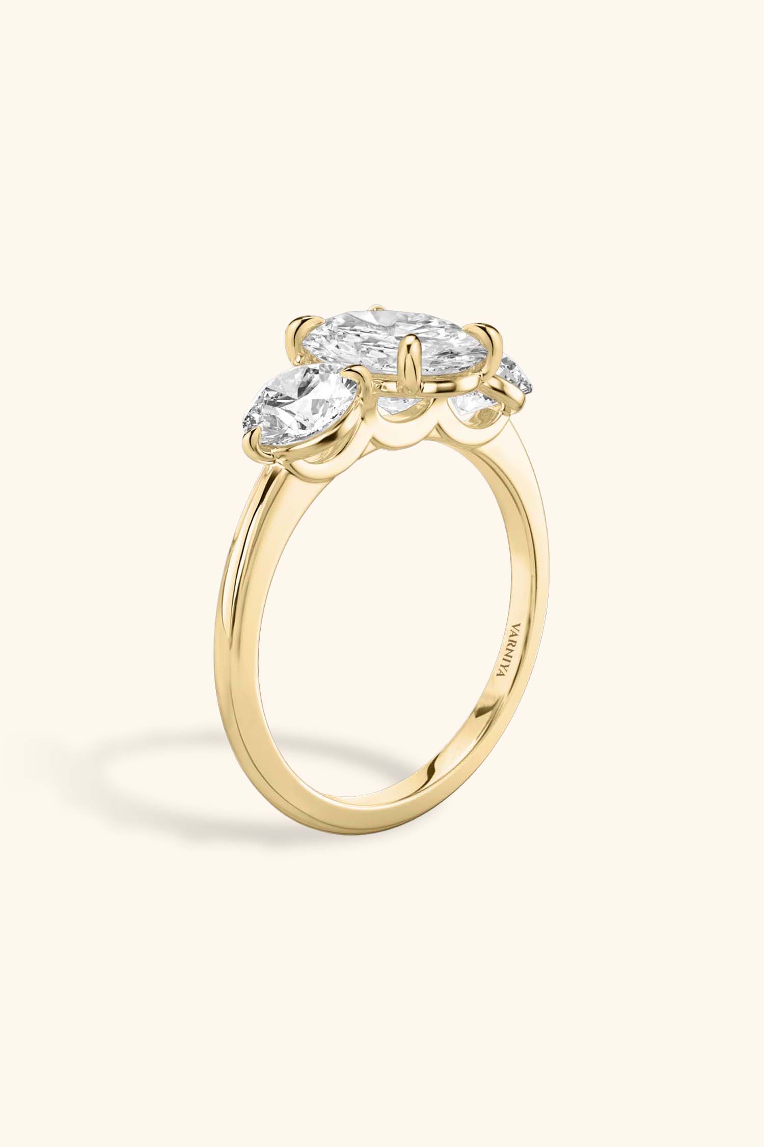 Trilogy Grace with Oval Solitaire Ring with 1/2 Carat Round Side Stones