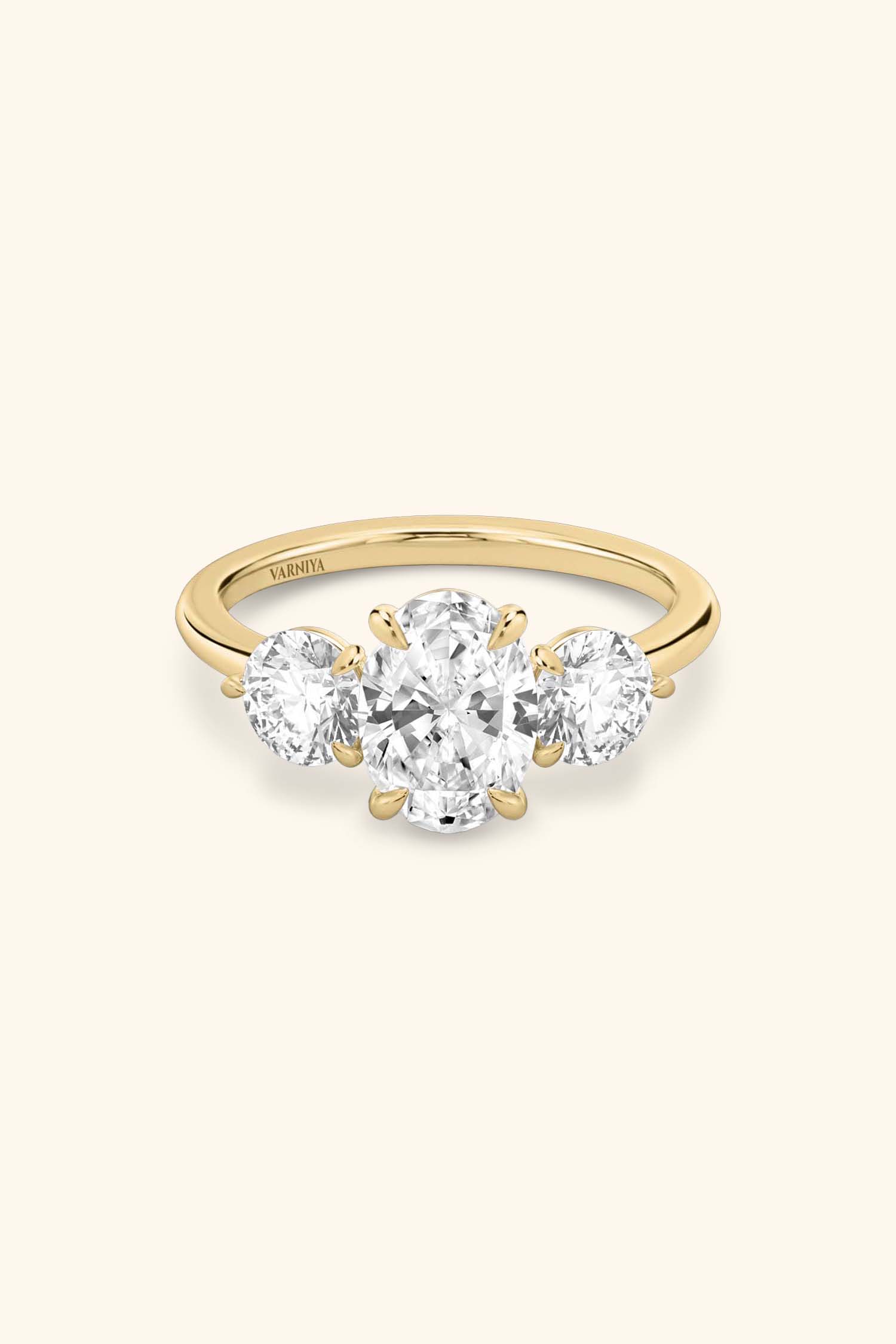 Trilogy Grace with Oval Solitaire Ring with 1/2 Carat Round Side Stones