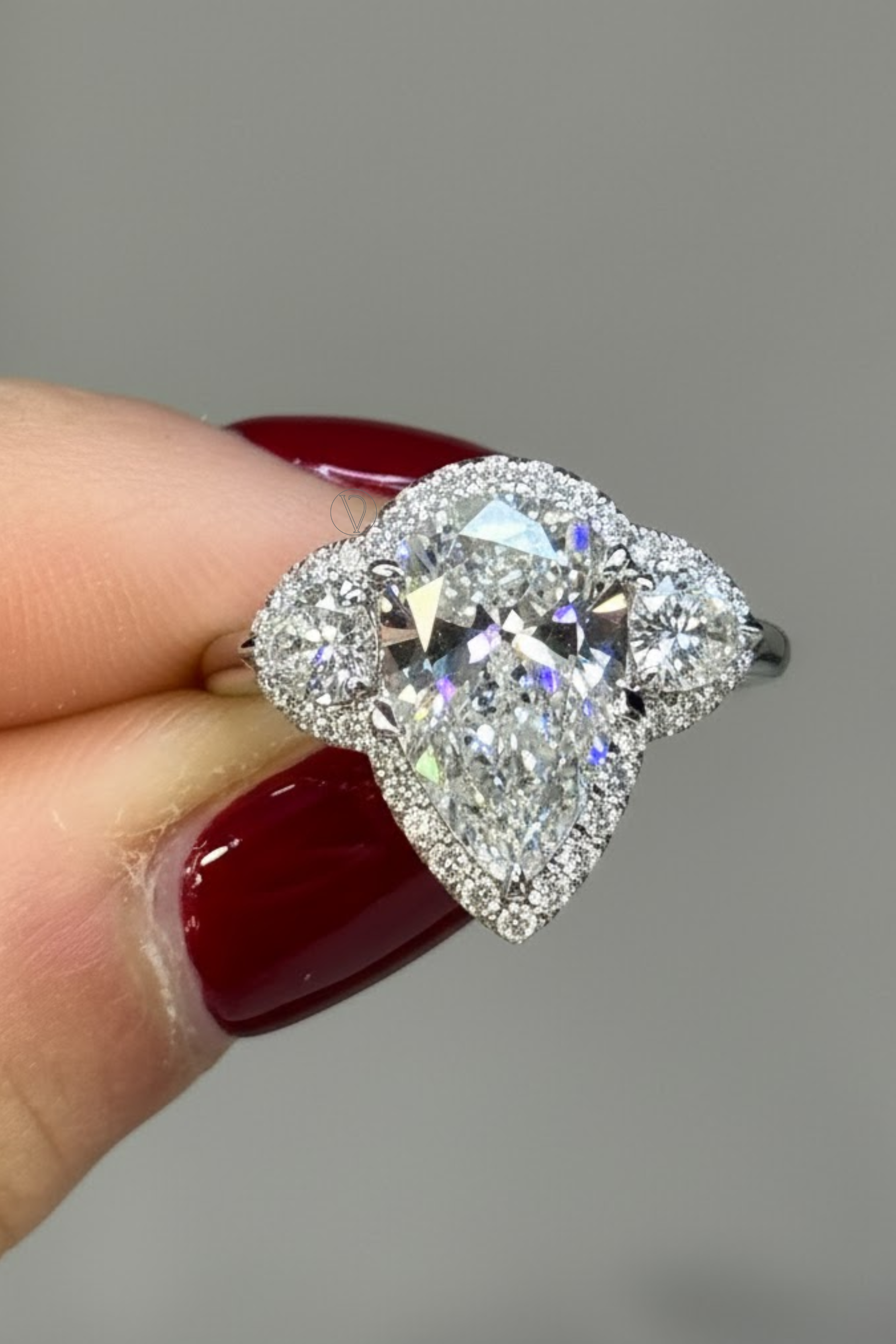 Pristara Three Stone Halo Ring