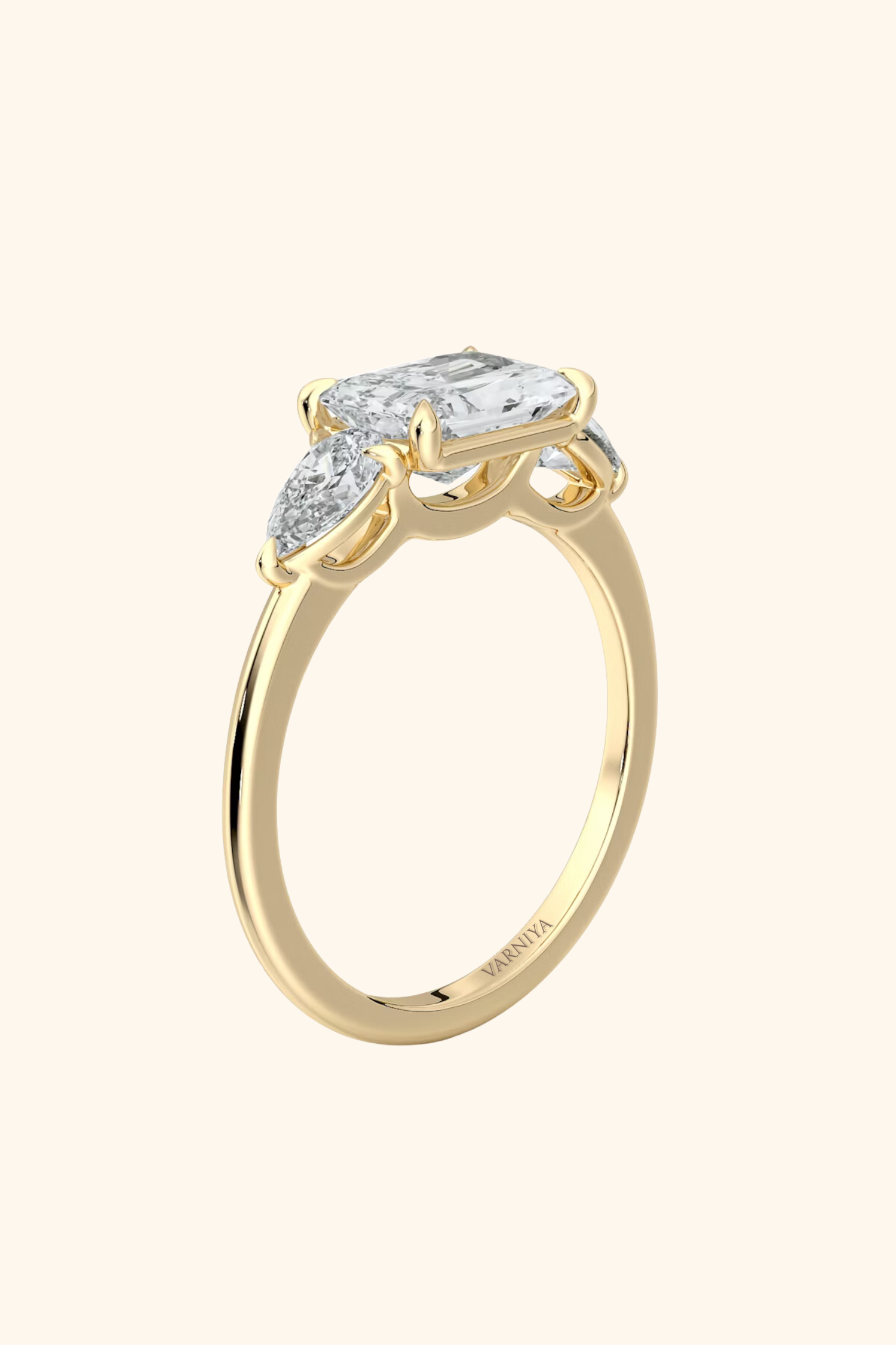 East West Radiant Solitaire Ring with Pear Side Stones