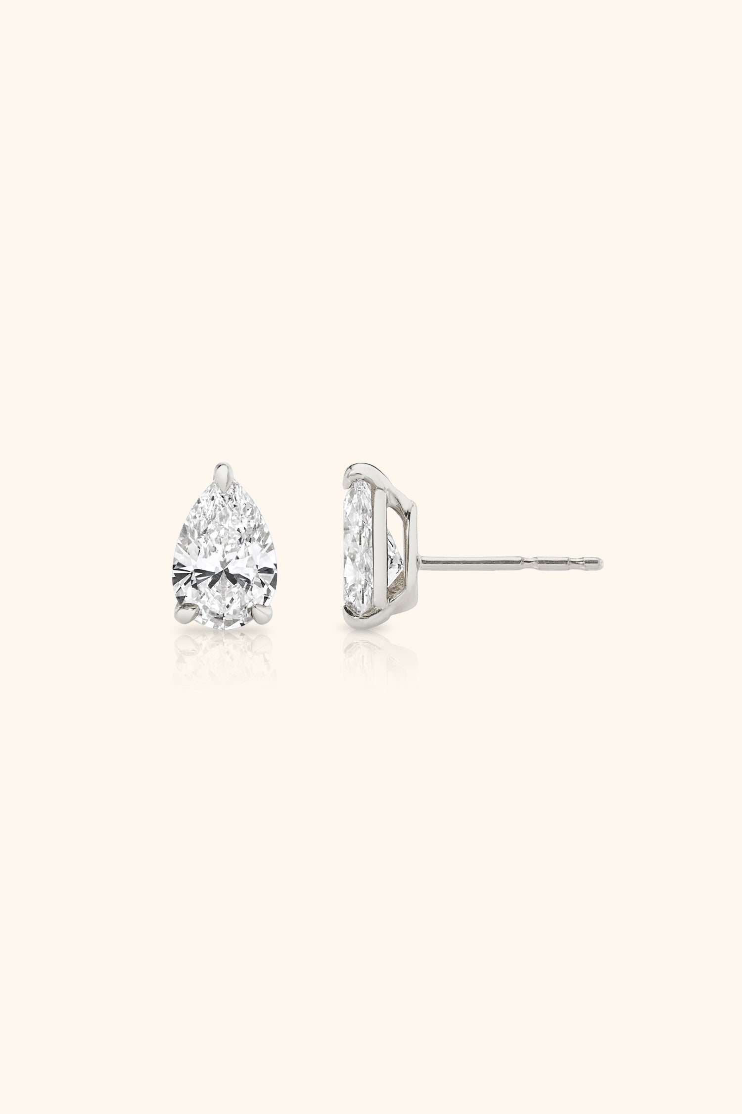 Classic Diamond Studds set with Pear Solitaire