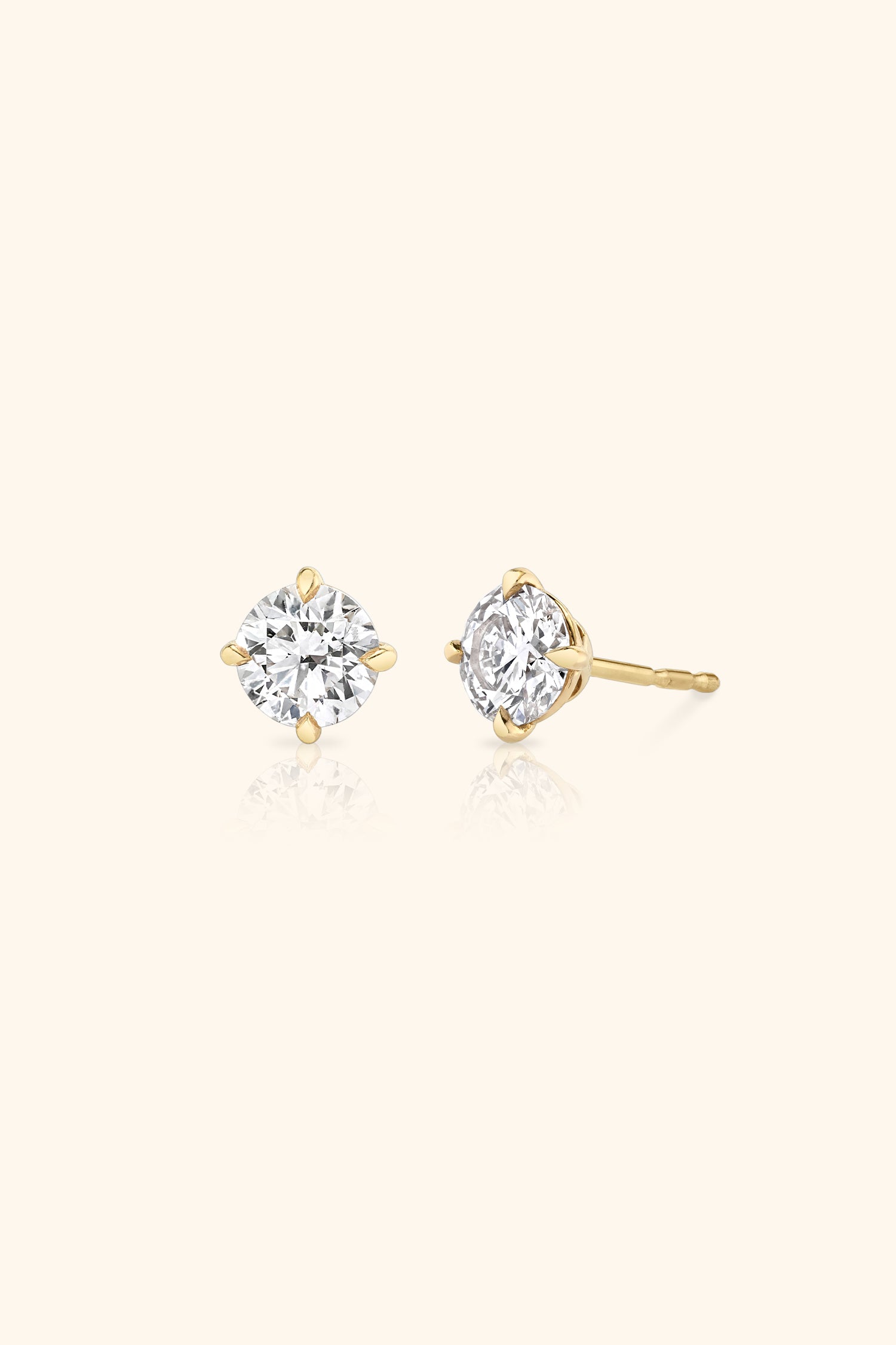 Classic Diamond Studds set with a Round Solitaire