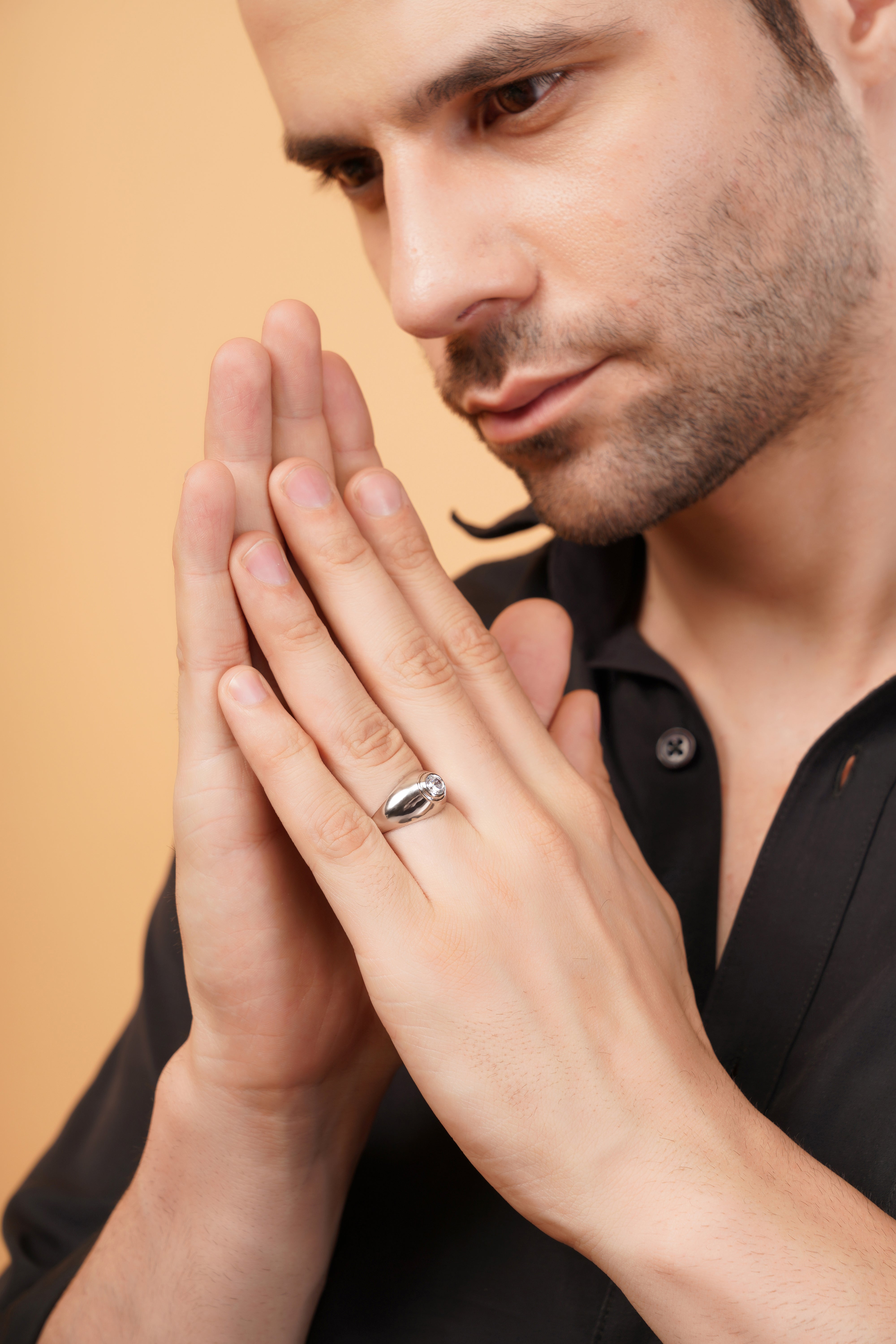 Regal Signet Ring with a Round Brilliant Solitaire