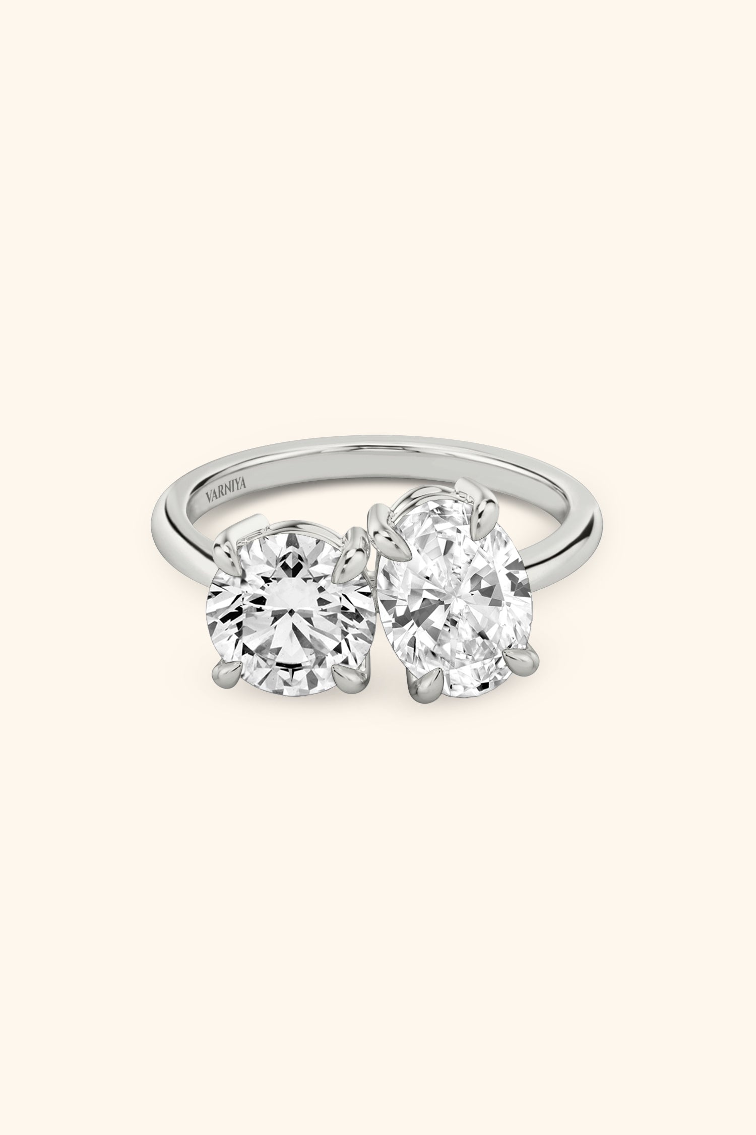 Luminosa Round Brilliant and Oval Solitaire Ring