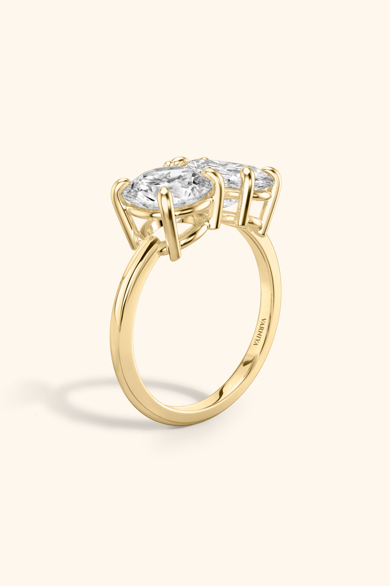 Luminosa Round Brilliant and Oval Solitaire Ring