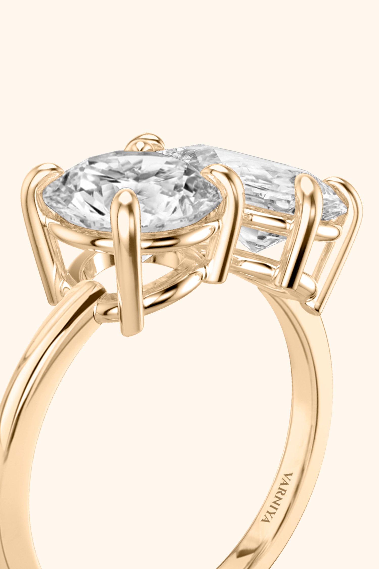 LUMINOSA ROUND AND PEAR SOLITAIRE RING