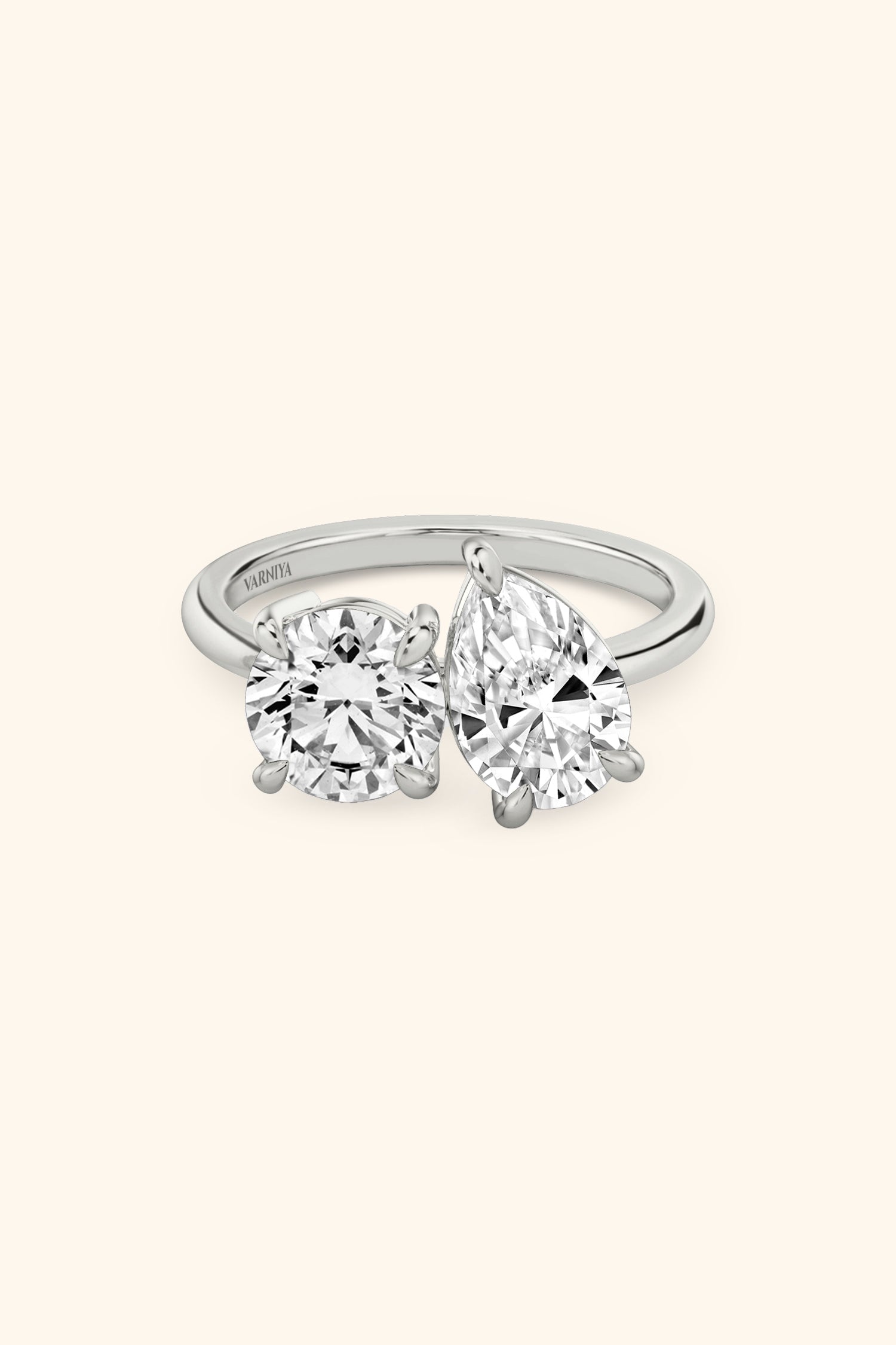 Luminosa Round and Pear Solitaire Ring