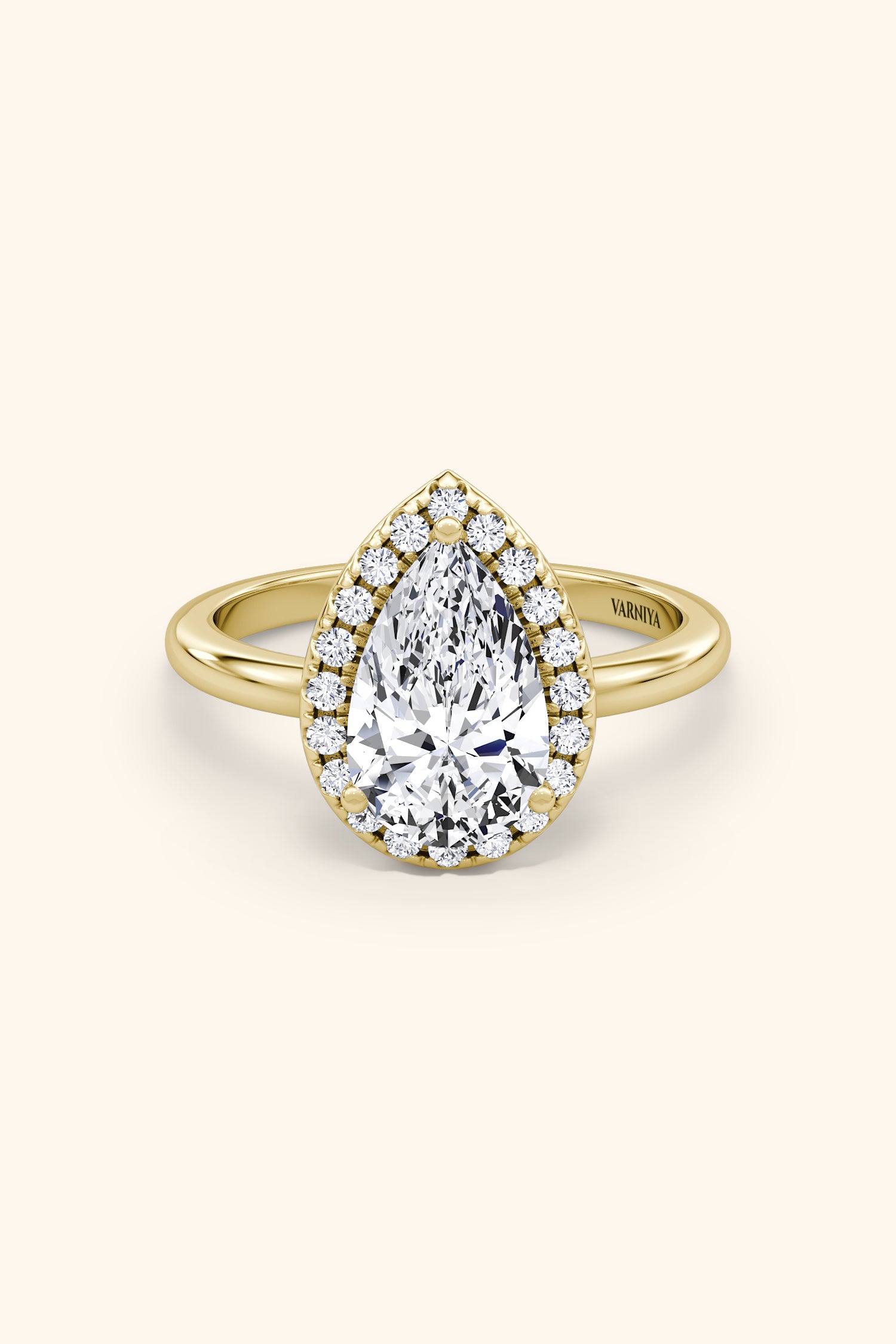 Angelica Pear Solitaire Ring with a Classic Halo