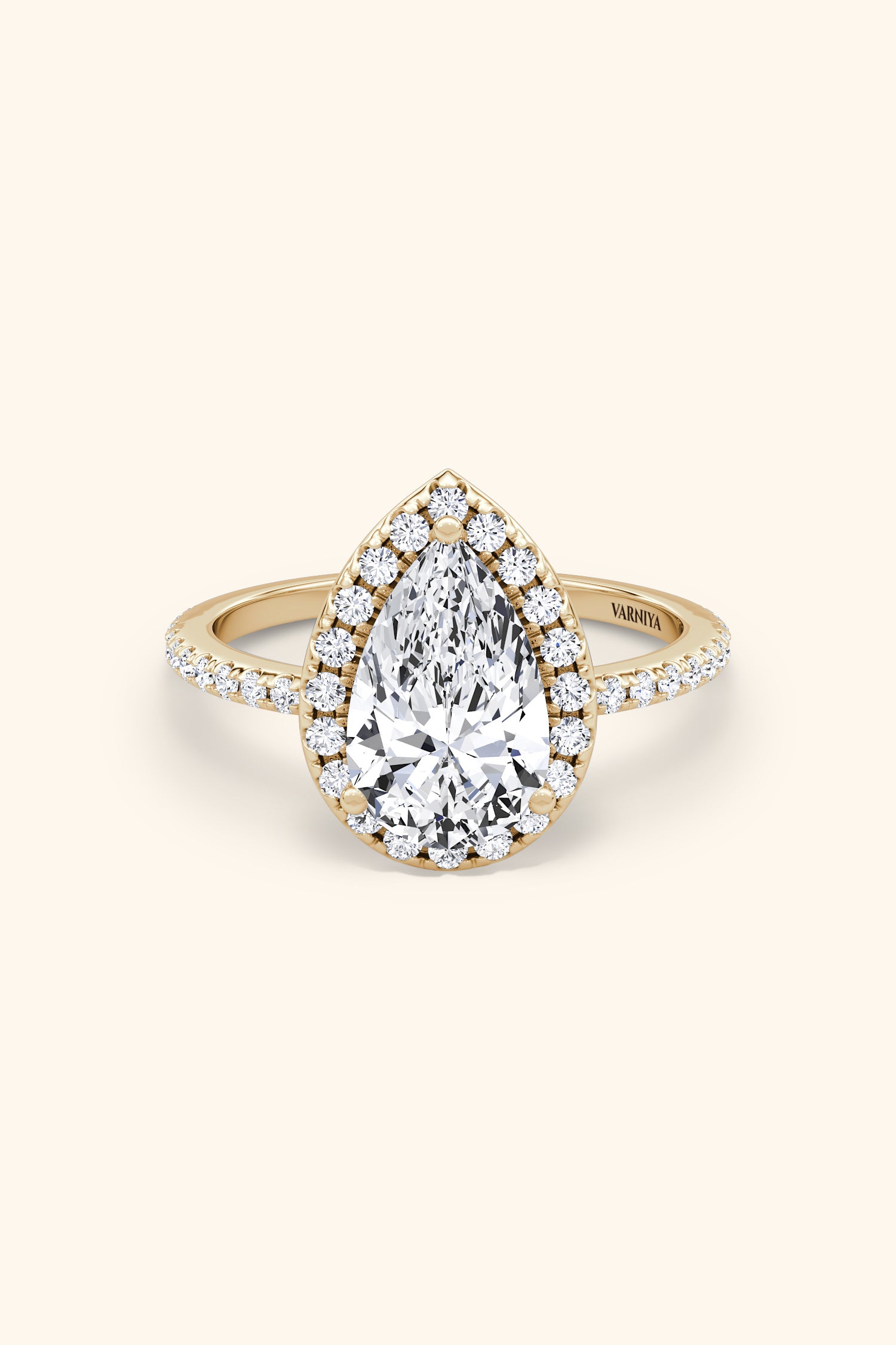 Angelica Pear Solitaire Pavé Ring with a Classic Halo