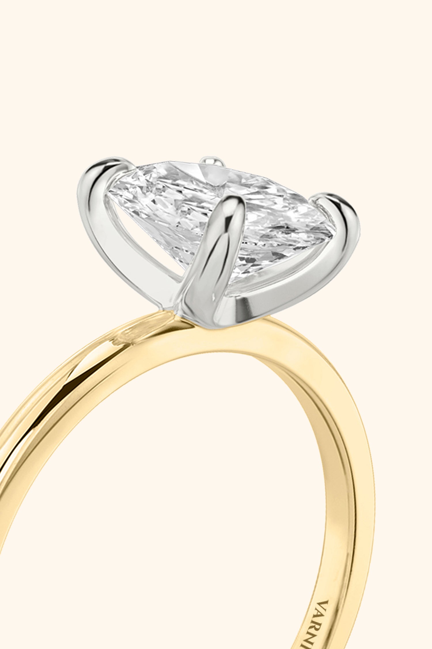 Dual Tone Glance Ring with an Oval Solitaire.